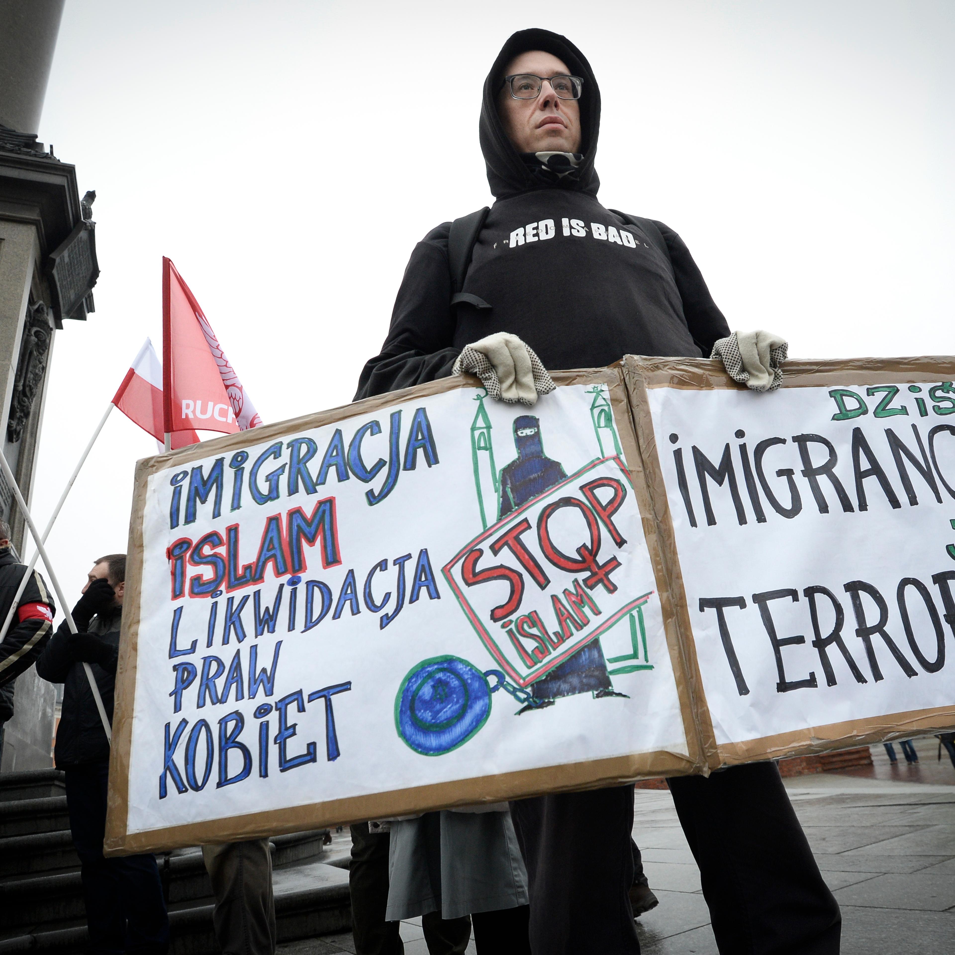 Several dozen members of the National Radical Camp demonstrate against immigration in Warsaw, Poland on Nov. 24, 2018.