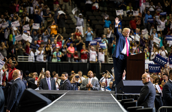 Republican presidential nominee Donald Trump waves at the end of his speech during a rally at the Jacksonville Veterans Memorial Arena on August 3, 2016 in Jacksonville, Florida.