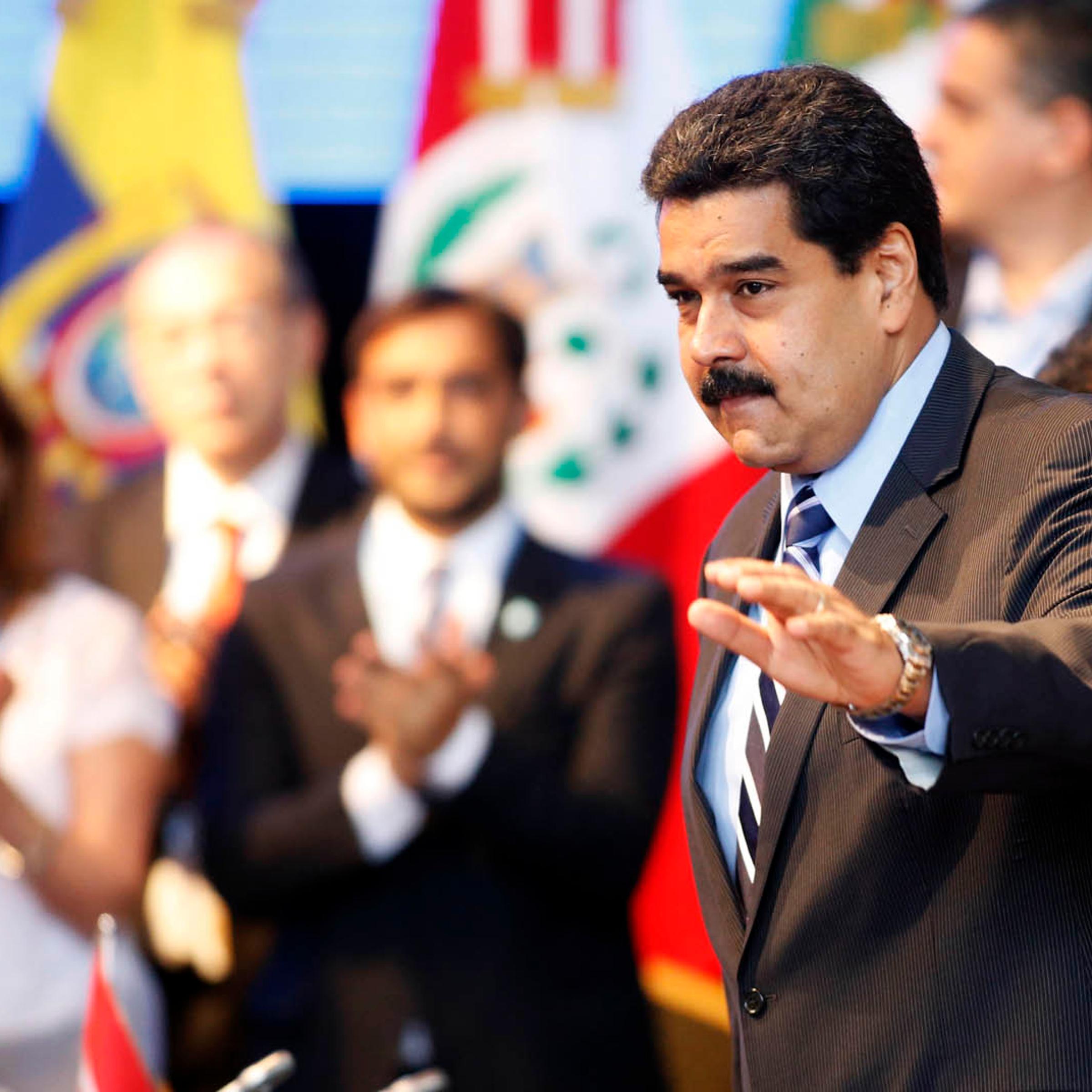 Venezuela's President Nicolas Maduro gestures during the Southern Common Market (MERCOSUR) trade bloc annual presidential 47th summit in Parana