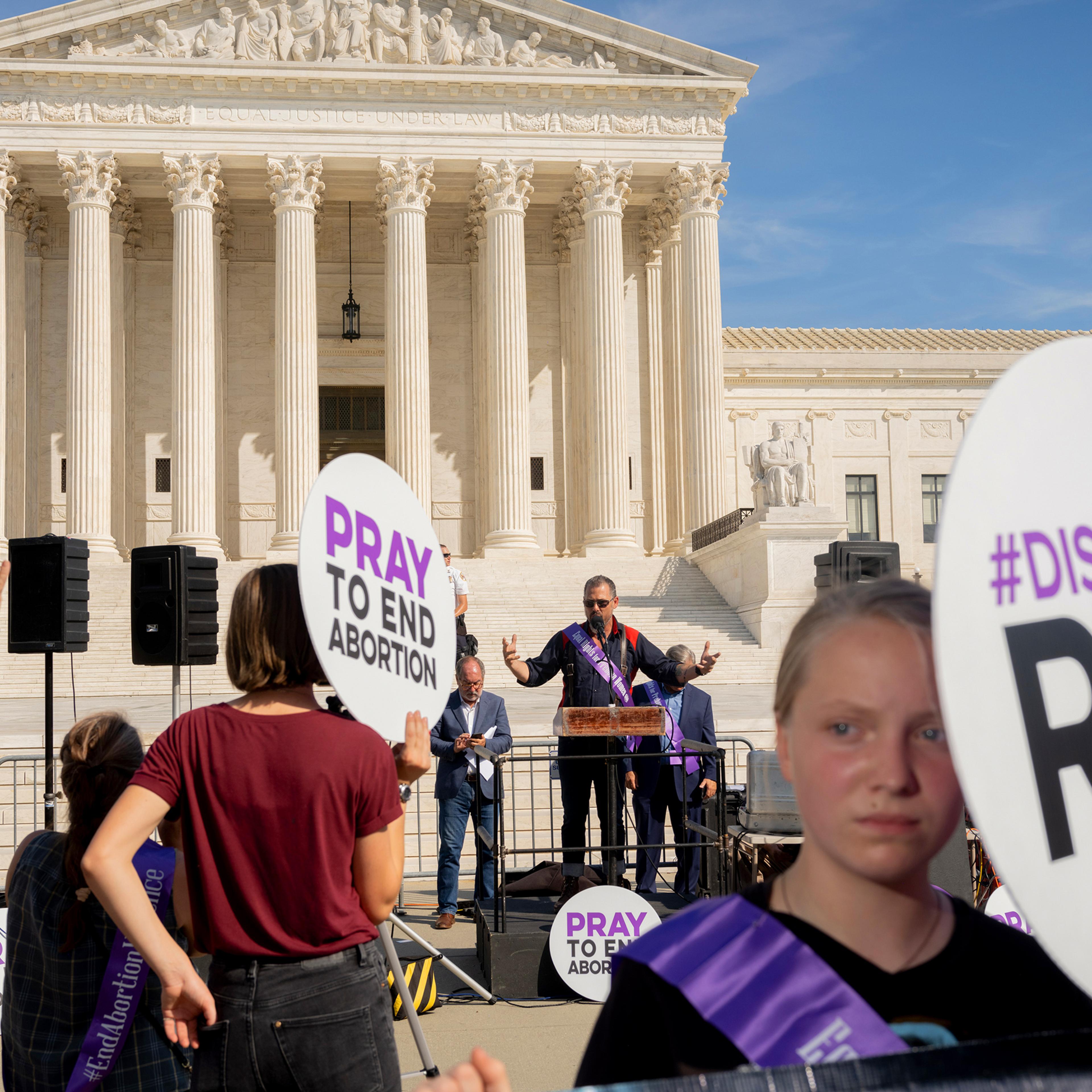 Protesters and counterprotesters meet outside of the Supreme Court at the Women's March and Rally for Abortion Justice in Washington, D.C., on Oct. 2.