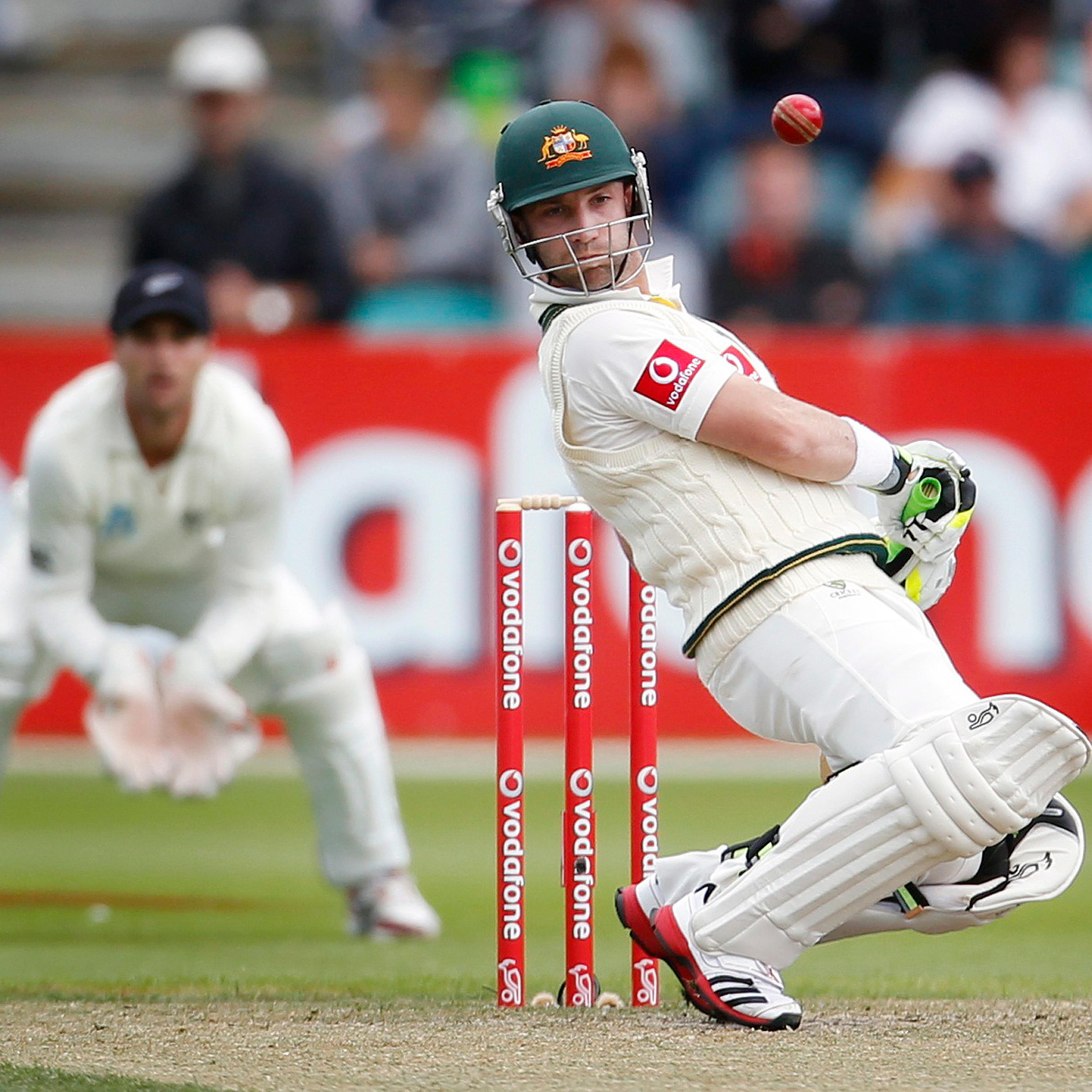Australia's Hughes avoids a high ball during the second cricket test match against New Zealand in Hobart