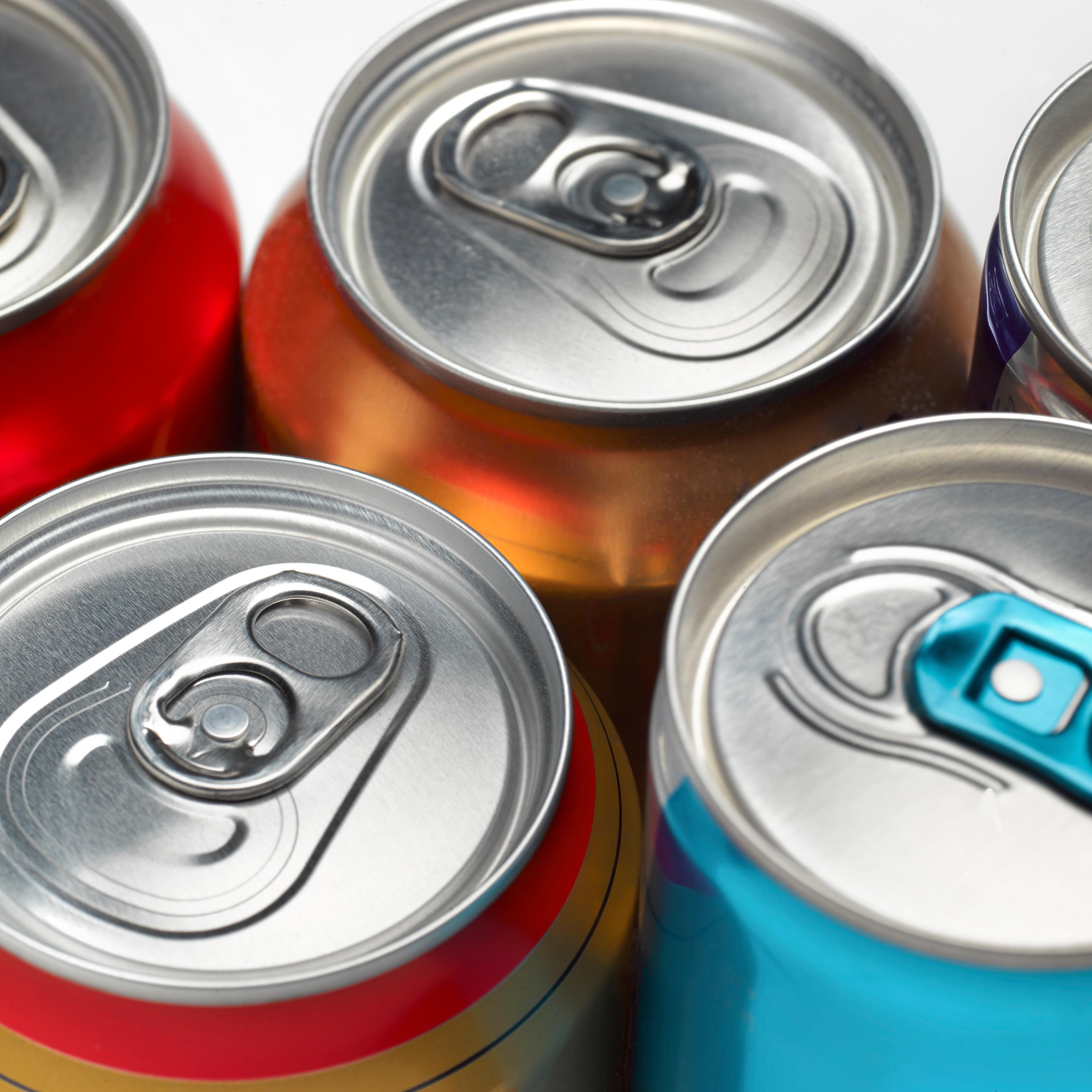 Cola soda fizzy drinks cans