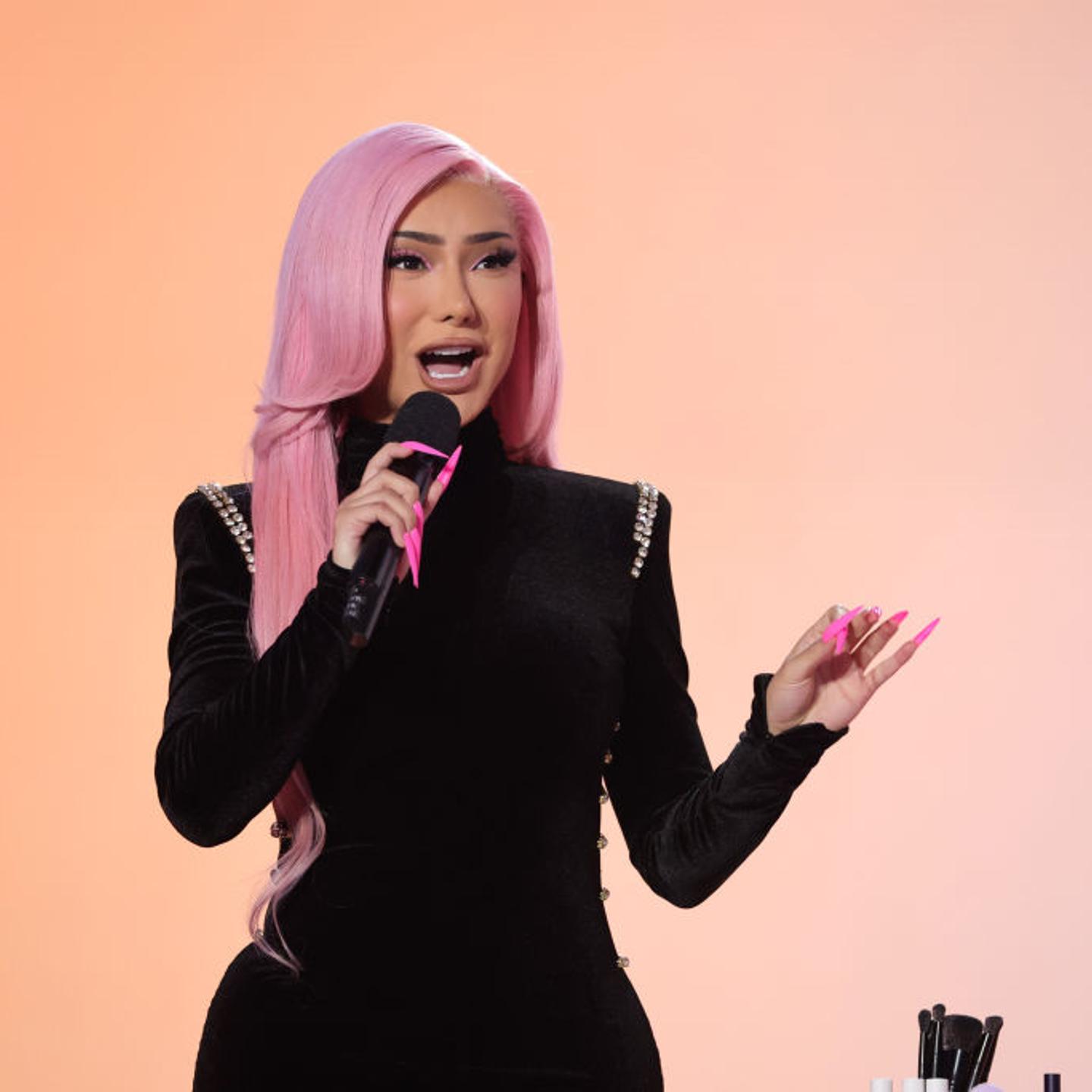 Nikita Dragun talking on stage