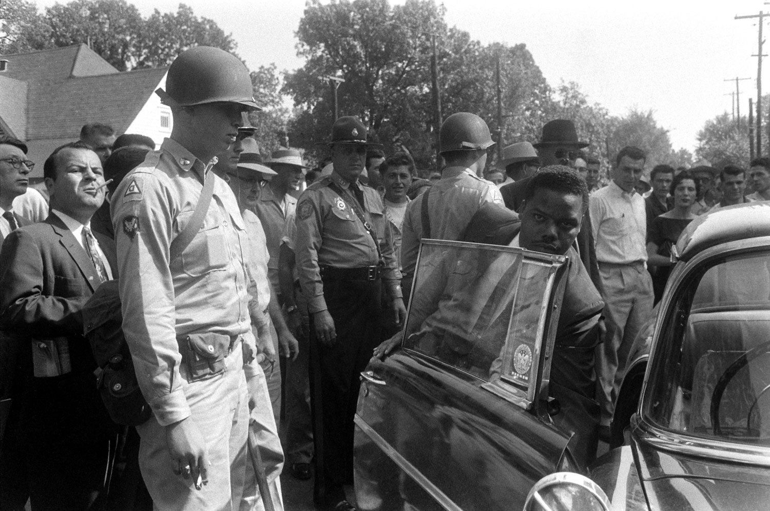 Members of the Little Rock Nine arrive at school, only to be turned away by Arkansas National Guardsmen, 1957.