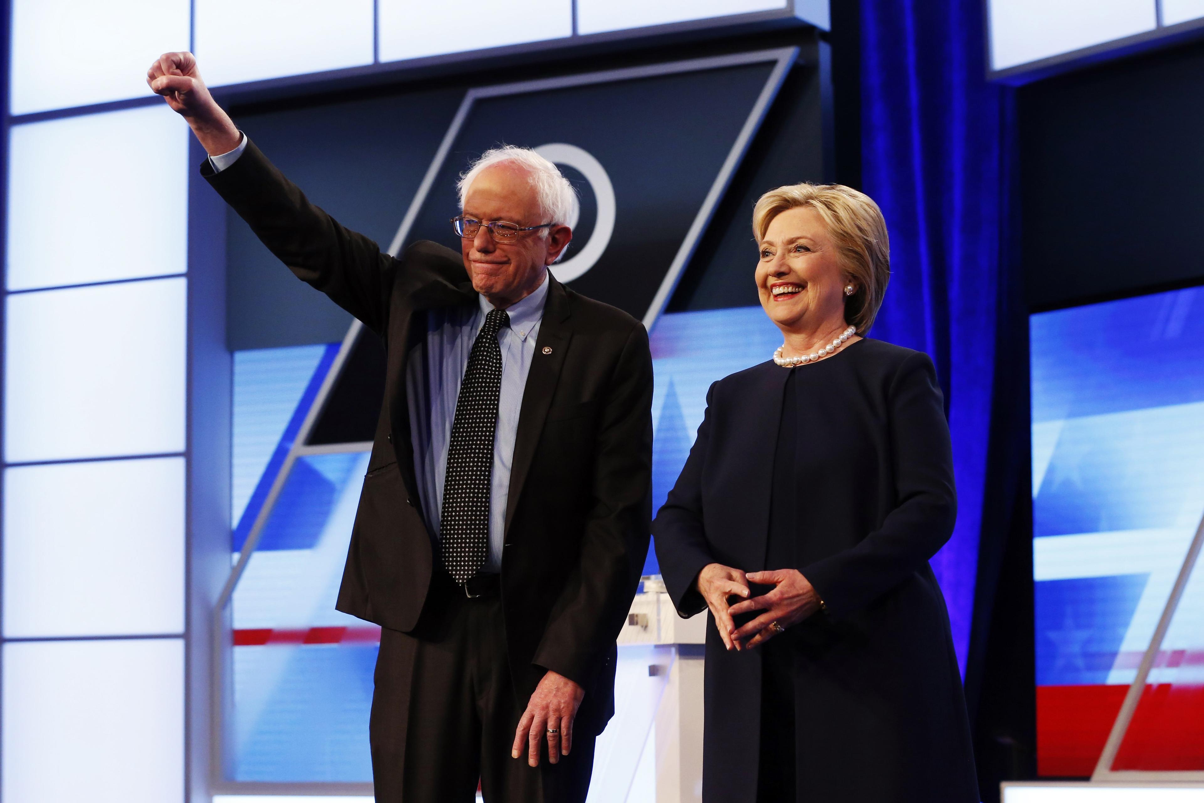 Clinton Sanders Democratic Debate: Clinton and Sanders Talk Differently