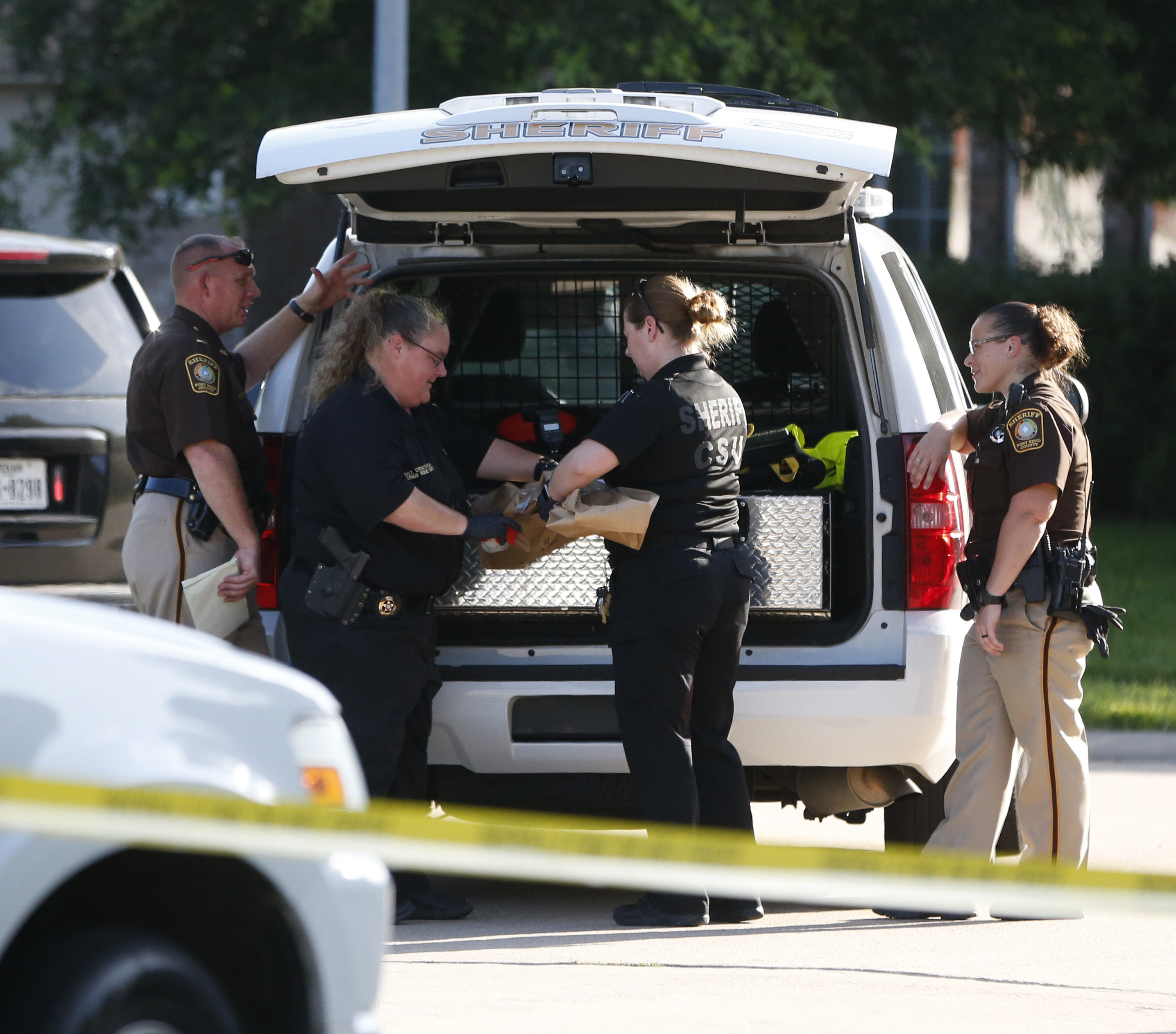 Mother Shoots Daughters