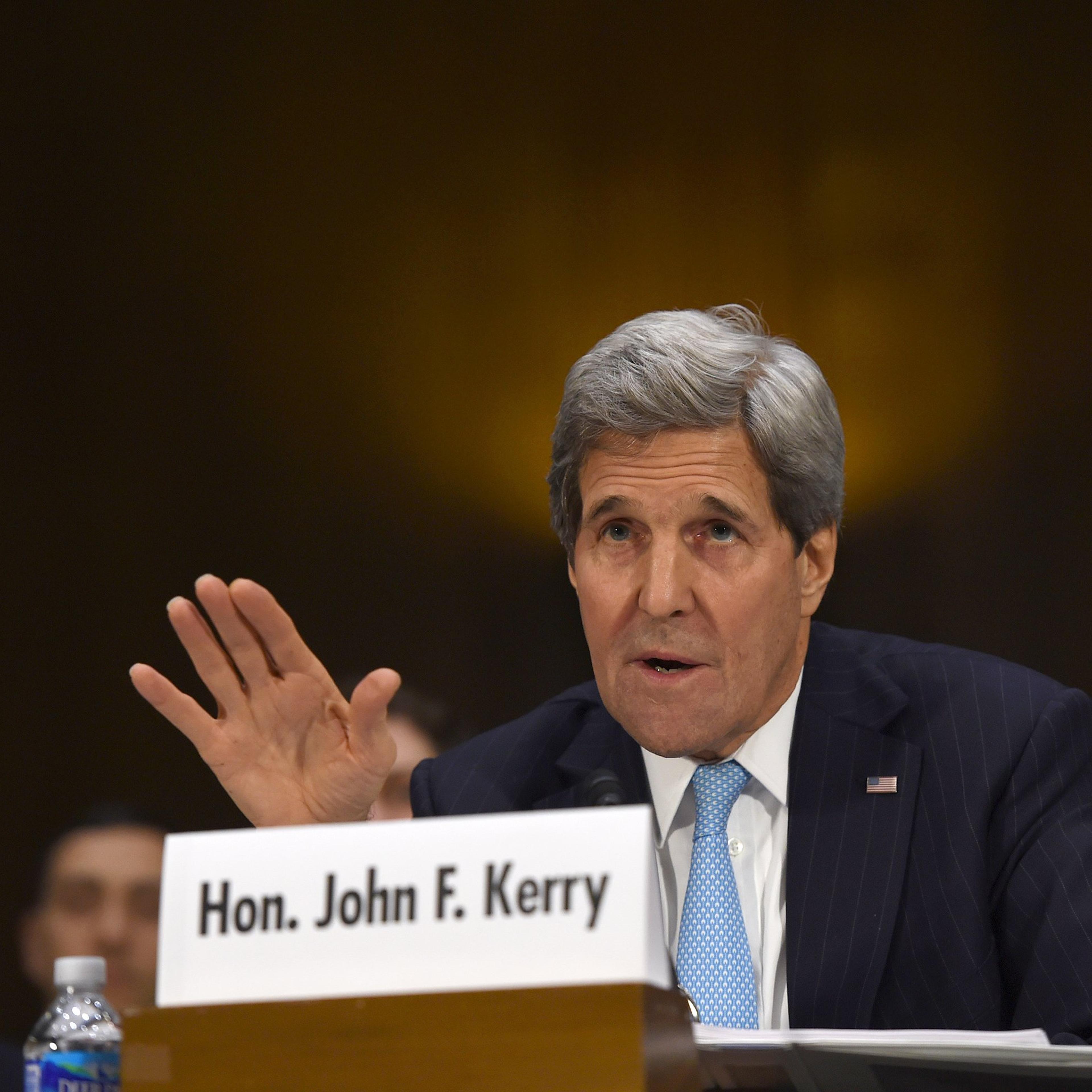 Secretary of State John Kerry testifies on Capitol Hill in Washington on Dec. 9, 2014, before the Senate Foreign Relations hearing on "Authorization for the Use of Military Force Against IS."