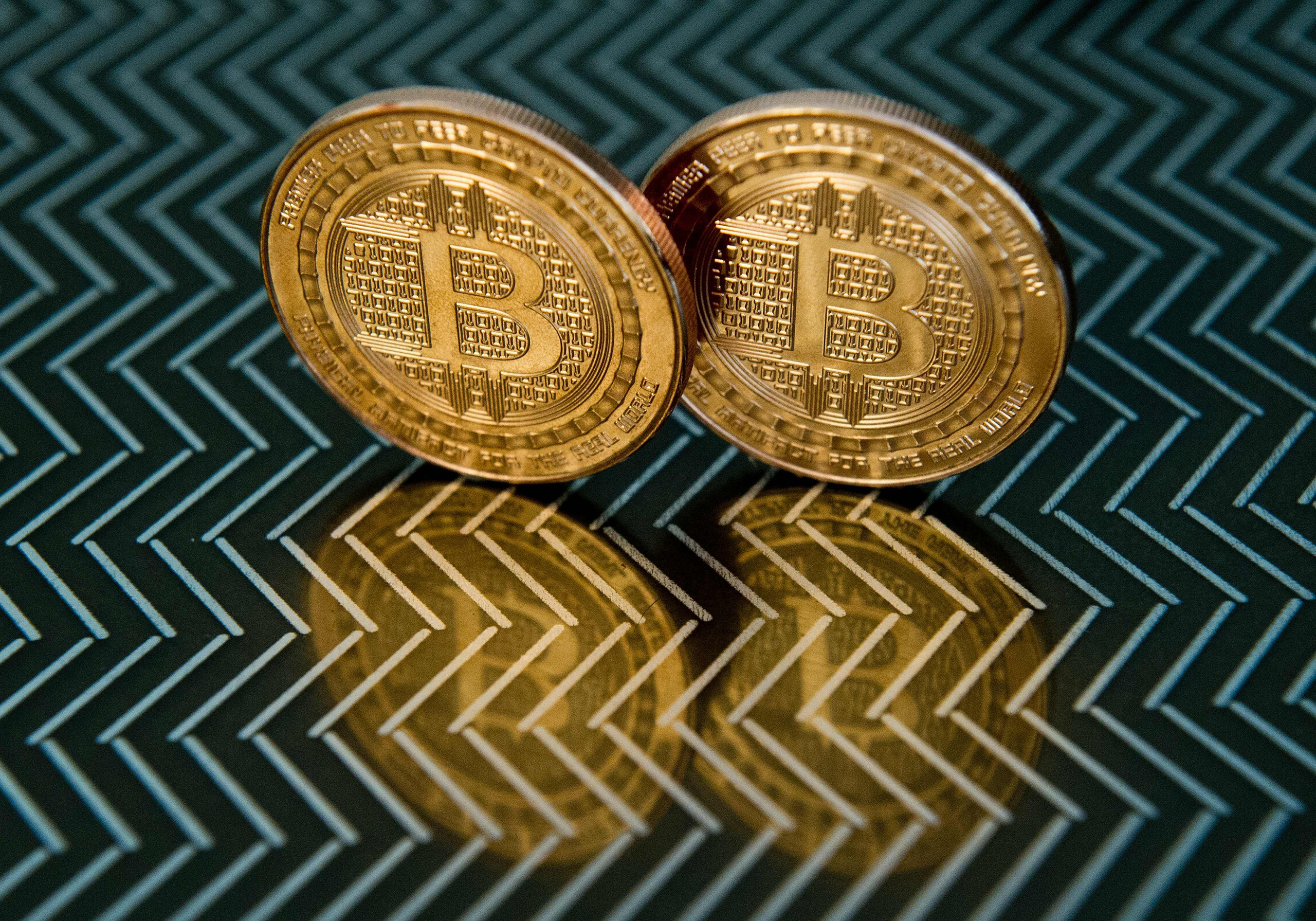 Bitcoin medals are seen in Washington, June 17, 2014. On May 2, an Australian entrepreneur, identified as Craig Wright, revealed himself as the creator following years of speculation about who invented the pioneering digital currency.