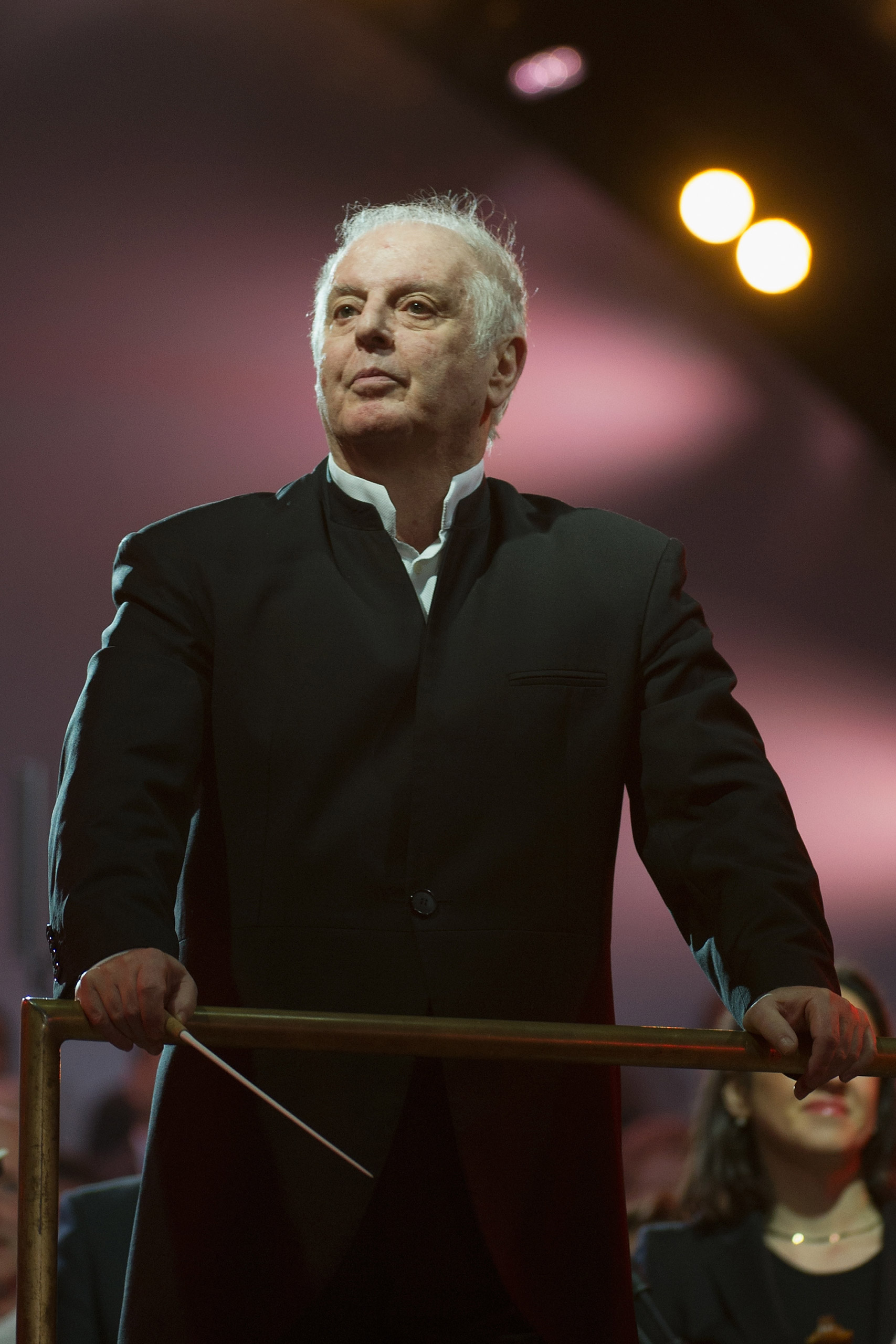 BERLIN, GERMANY - NOVEMBER 09: Conductor Daniel Barenboim performs at Brandenburg Gate during celebrations on the 25th anniversary of the fall of Wall on November 9, 2014 in Berlin, Germany. The city of Berlin is is commemorating the 25th anniversary of 
