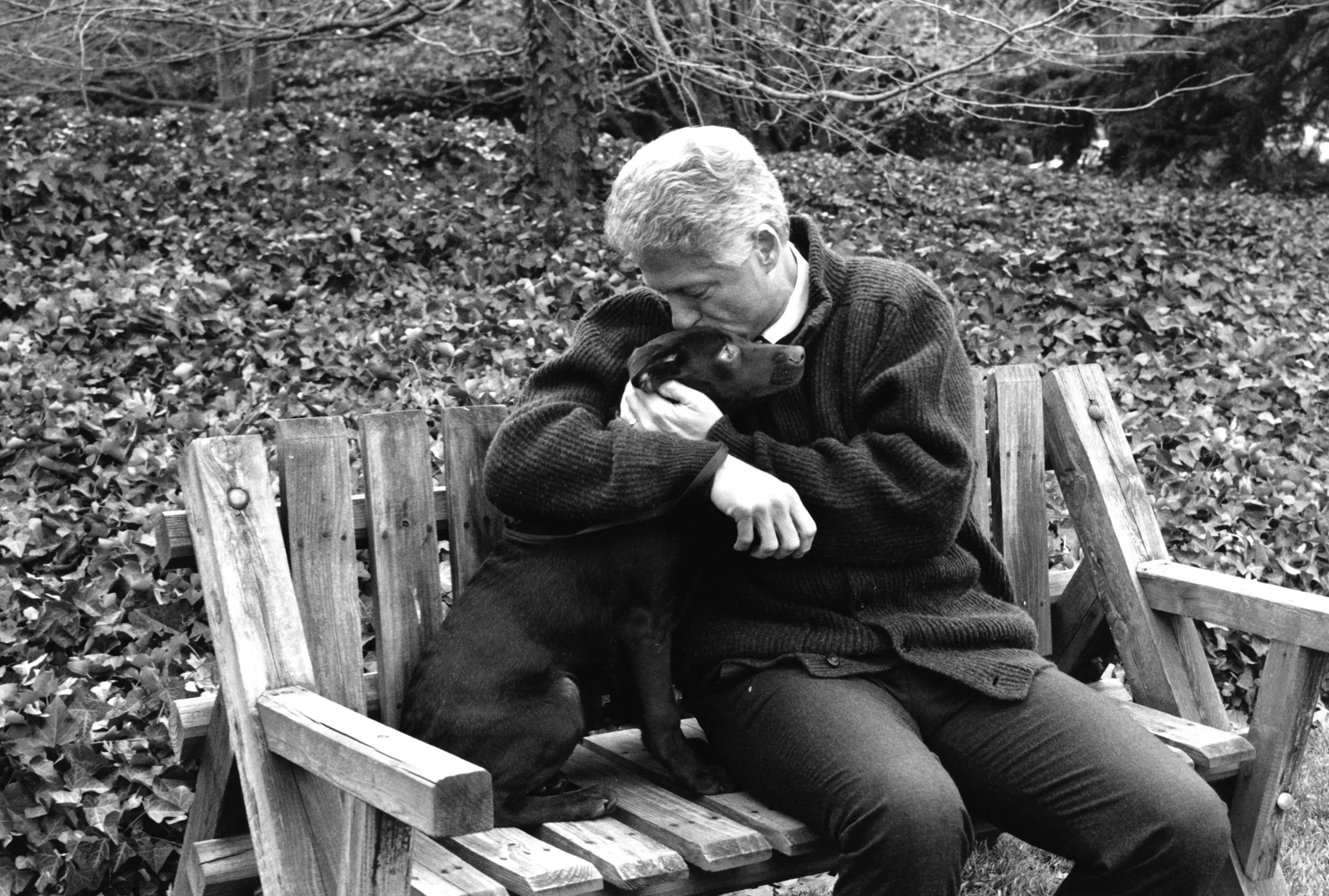 The first time President Clinton met Buddy, the chocolate lab that became the family's pet. He took the dog on a walk around the South Lawn. "I asked the President if I could accompany them so I could take photos," says Barbara Kinney.