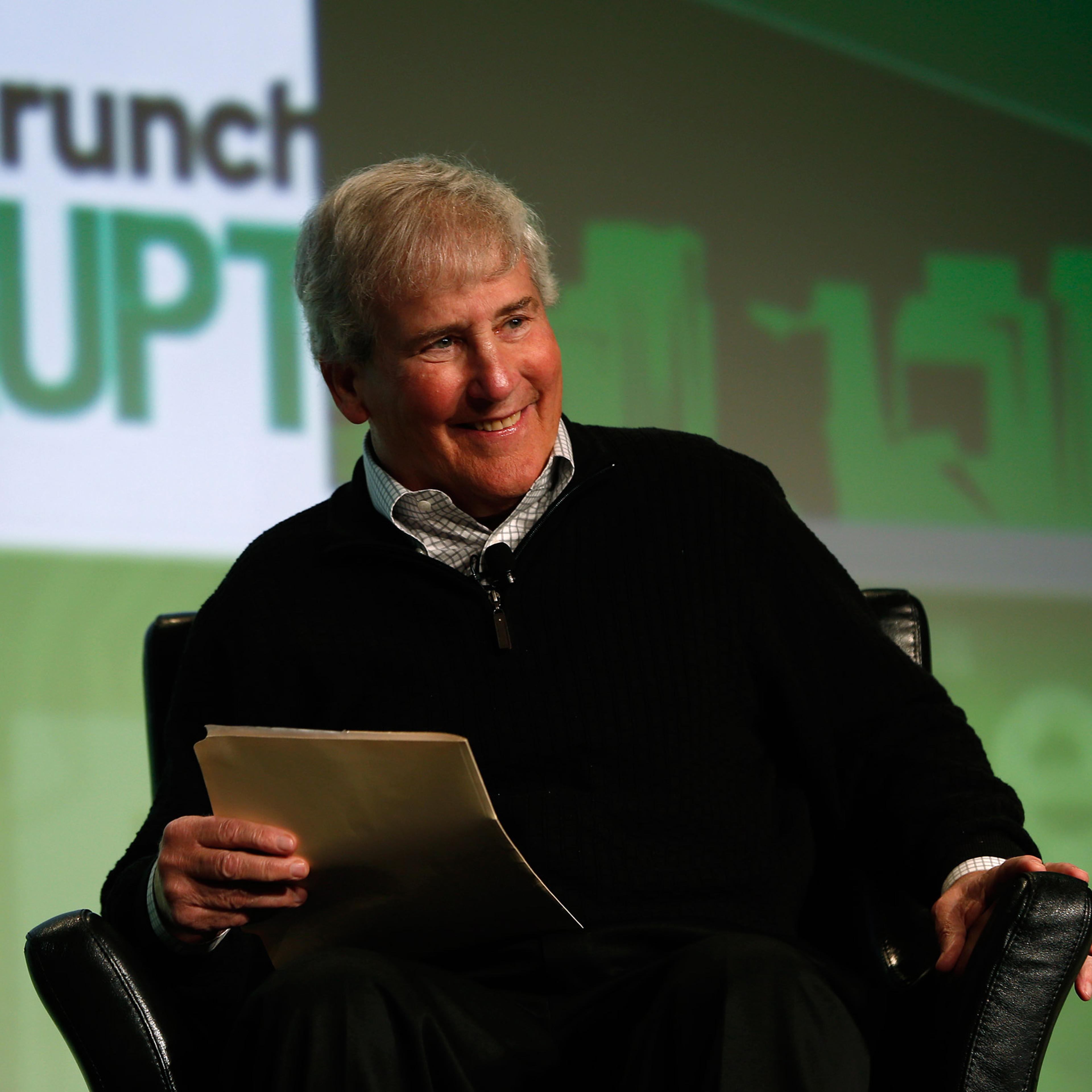 Bill Campbell, chairman of the board and former chief executive of Intuit Inc., smiles as he moderates a fireside chat with Ben Horowitz of Andreessen Horowitz during day one of TechCrunch Disrupt SF 2012 event at the San Francisco Design Center Concours