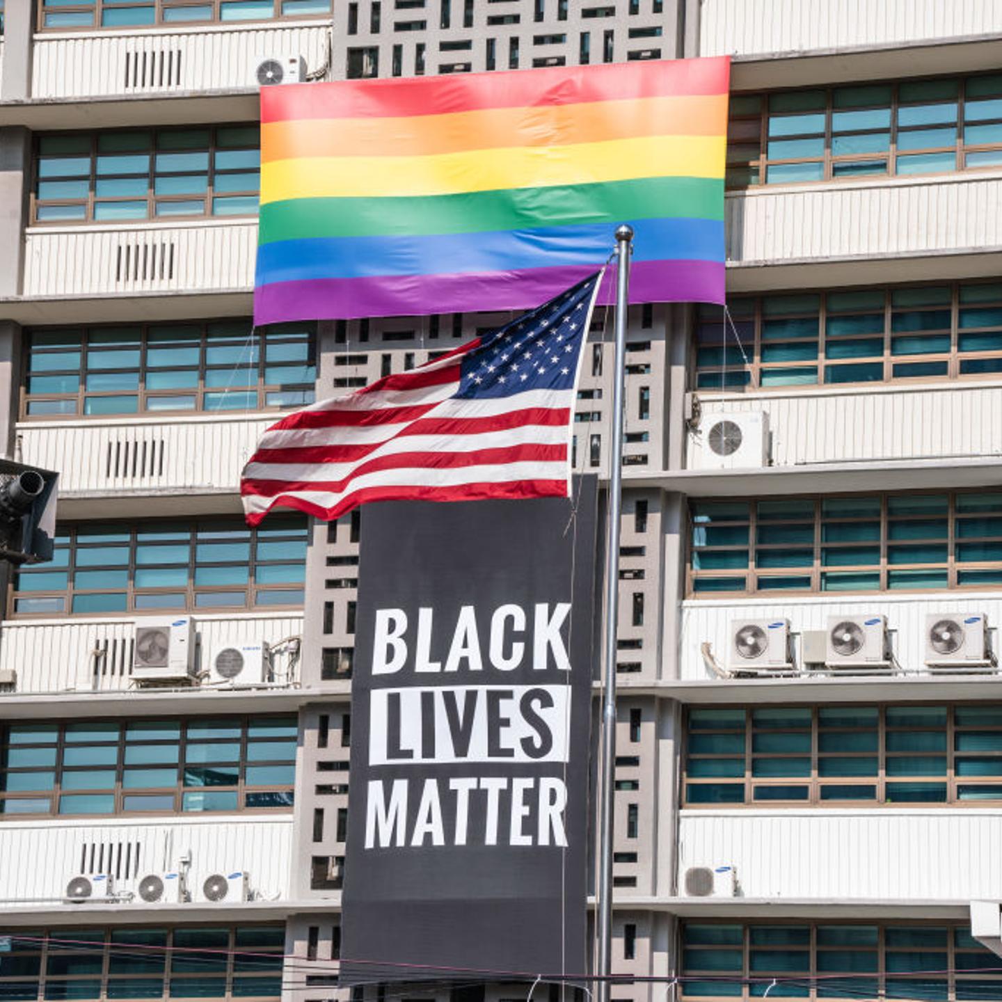 A Black Lives Matter banner, a United States national flag