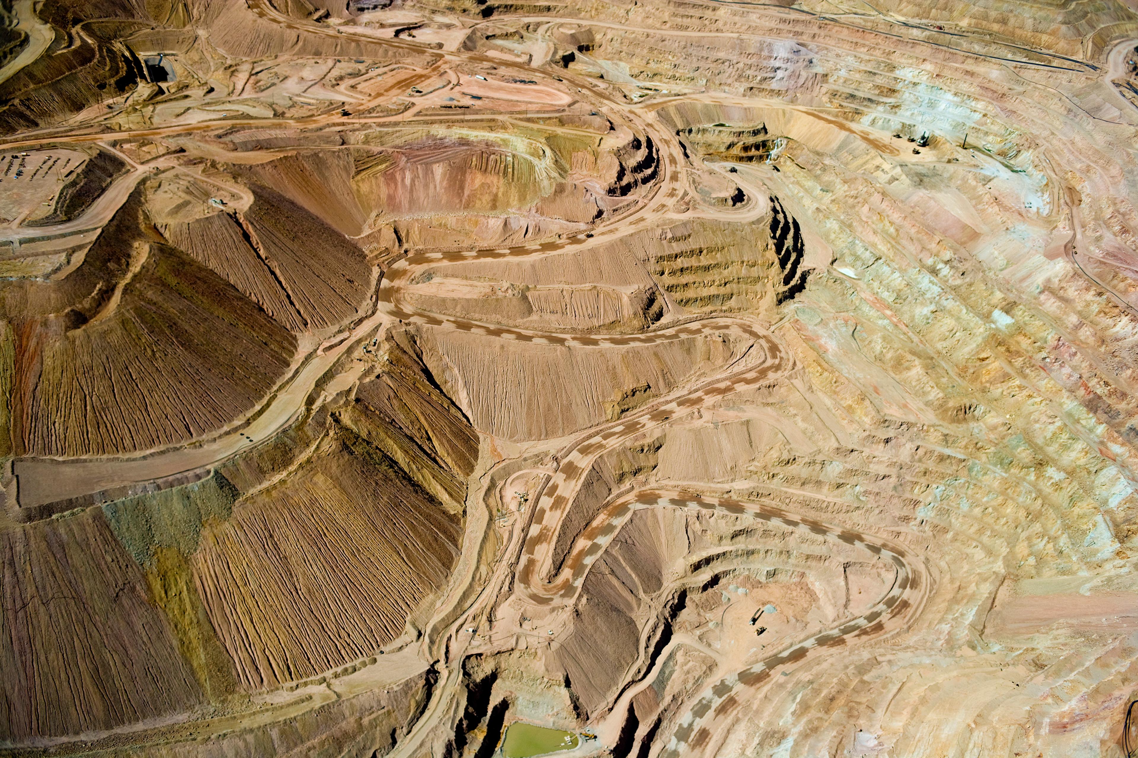 Silver City, New MexicoAt this mine, dilute sulfuric acid is percolated through enormous heaps of oxidized, low-grade ore (well under one per cent copper). The acid dissolves the copper and the resulting leachate is collected at the bottom of the heaps.