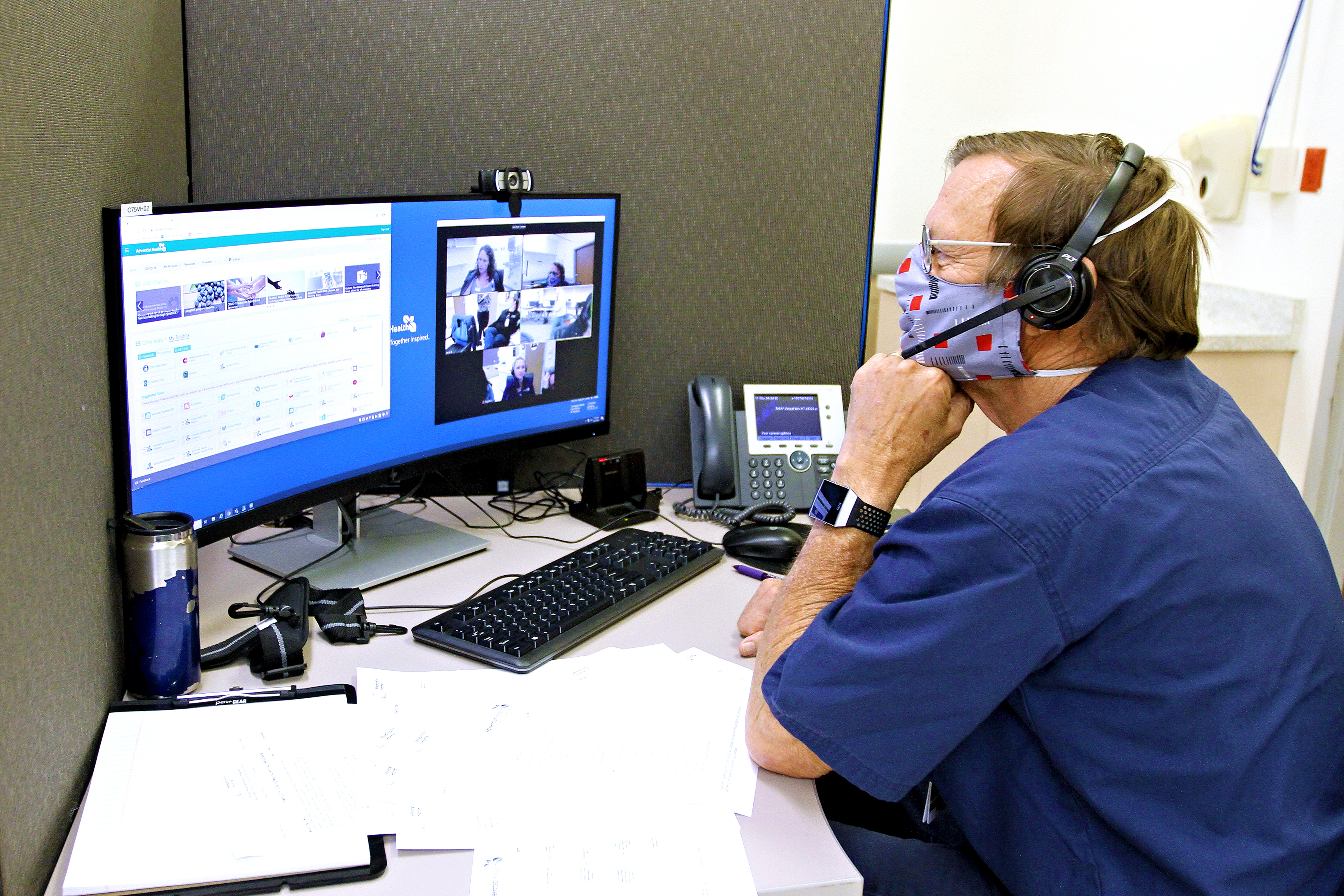 A doctor in Adventist Health's command center for its hospital-at-home program.