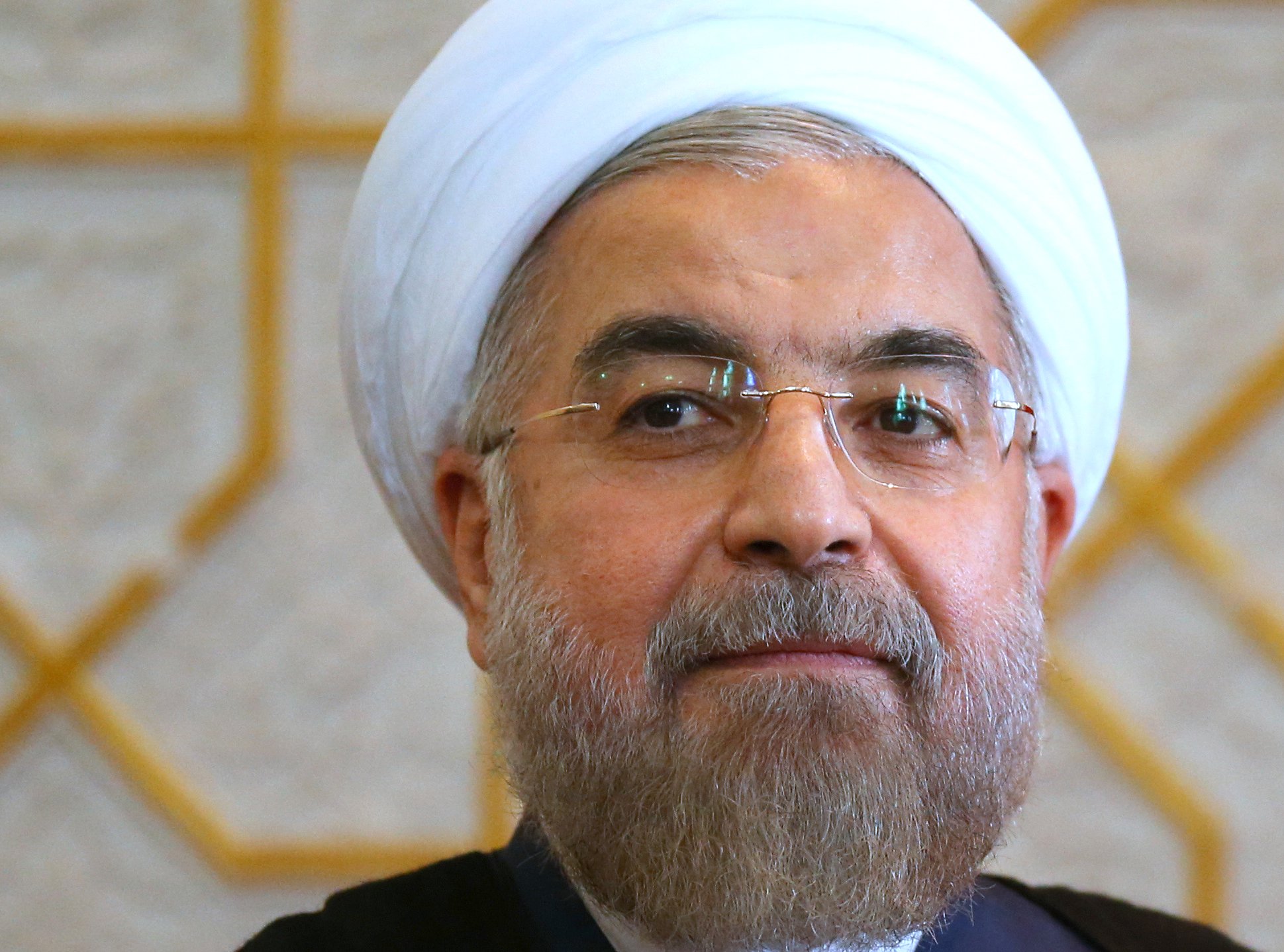 Iran's president Hassan Rouhani looks on during a meeting with Russia's president Vladimir Putin as part of the Shanghai Cooperation Organisation (SCO) summit. on Sept. 12, 2014.