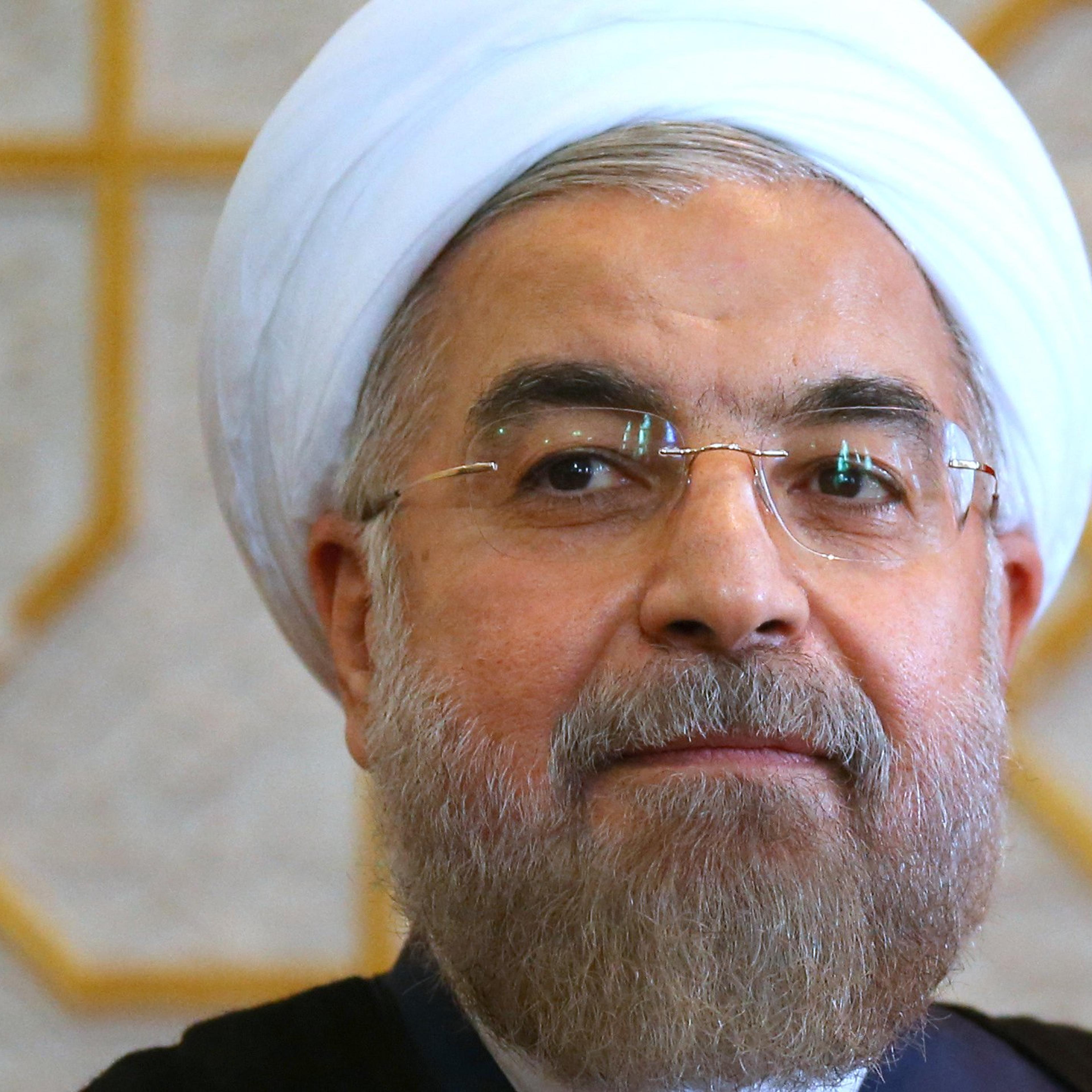 Iran's president Hassan Rouhani looks on during a meeting with Russia's president Vladimir Putin as part of the Shanghai Cooperation Organisation (SCO) summit. on Sept. 12, 2014.