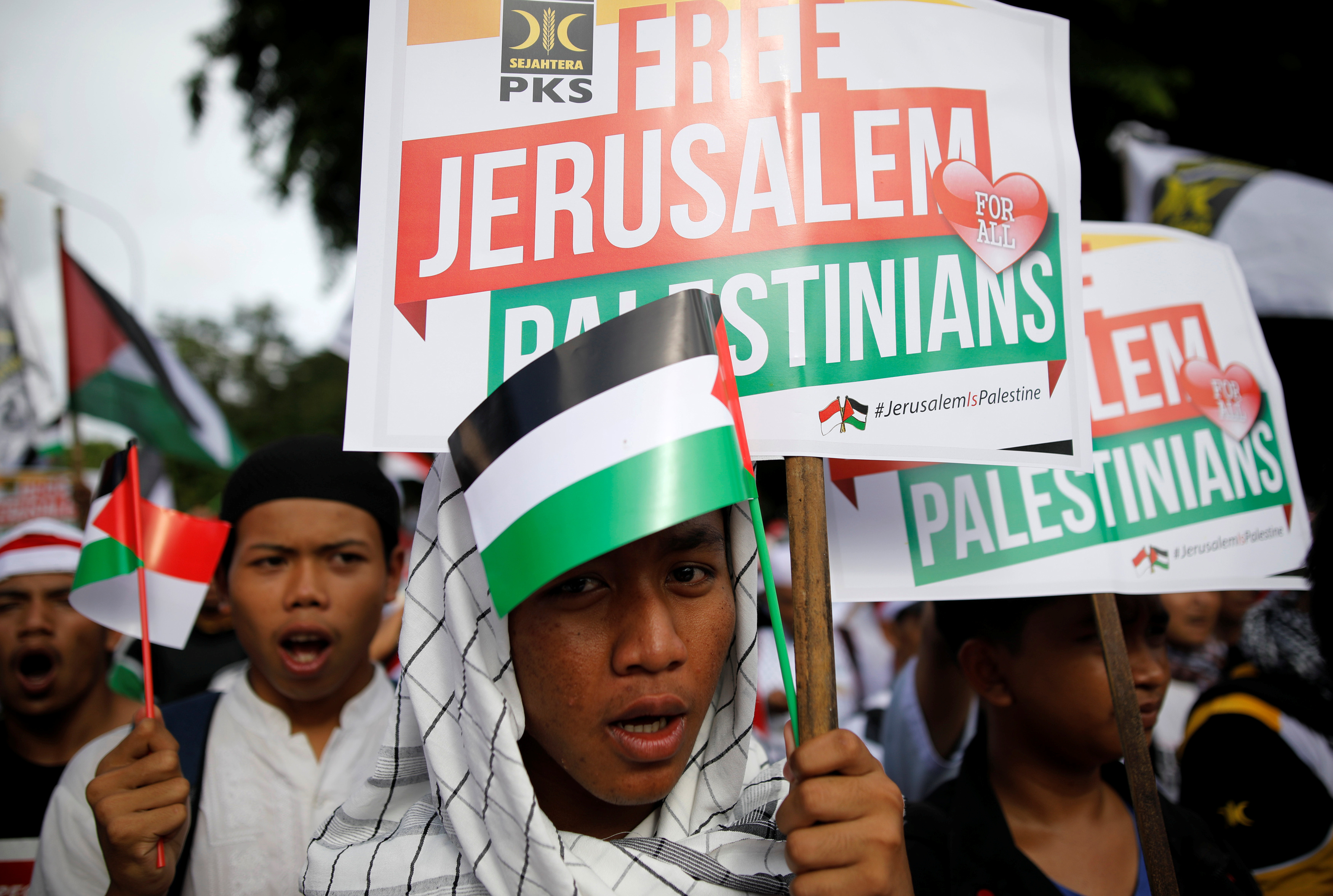 Protesters hold a rally outside the U.S. embassy in Jakarta, Indonesia, to condemn the U.S. decision to recognise Jerusalem as Israel's capital