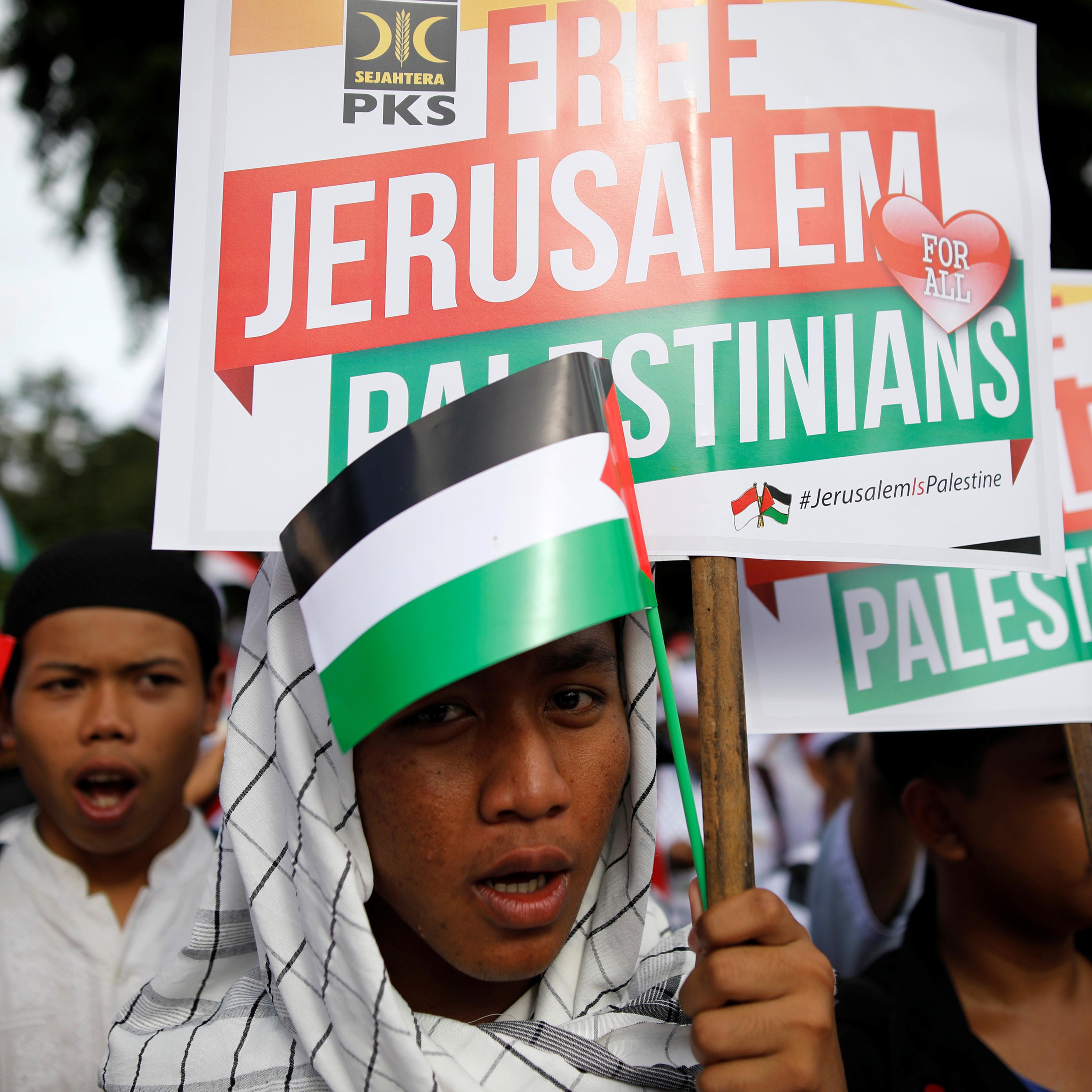 Protesters hold a rally outside the U.S. embassy in Jakarta, Indonesia, to condemn the U.S. decision to recognise Jerusalem as Israel's capital