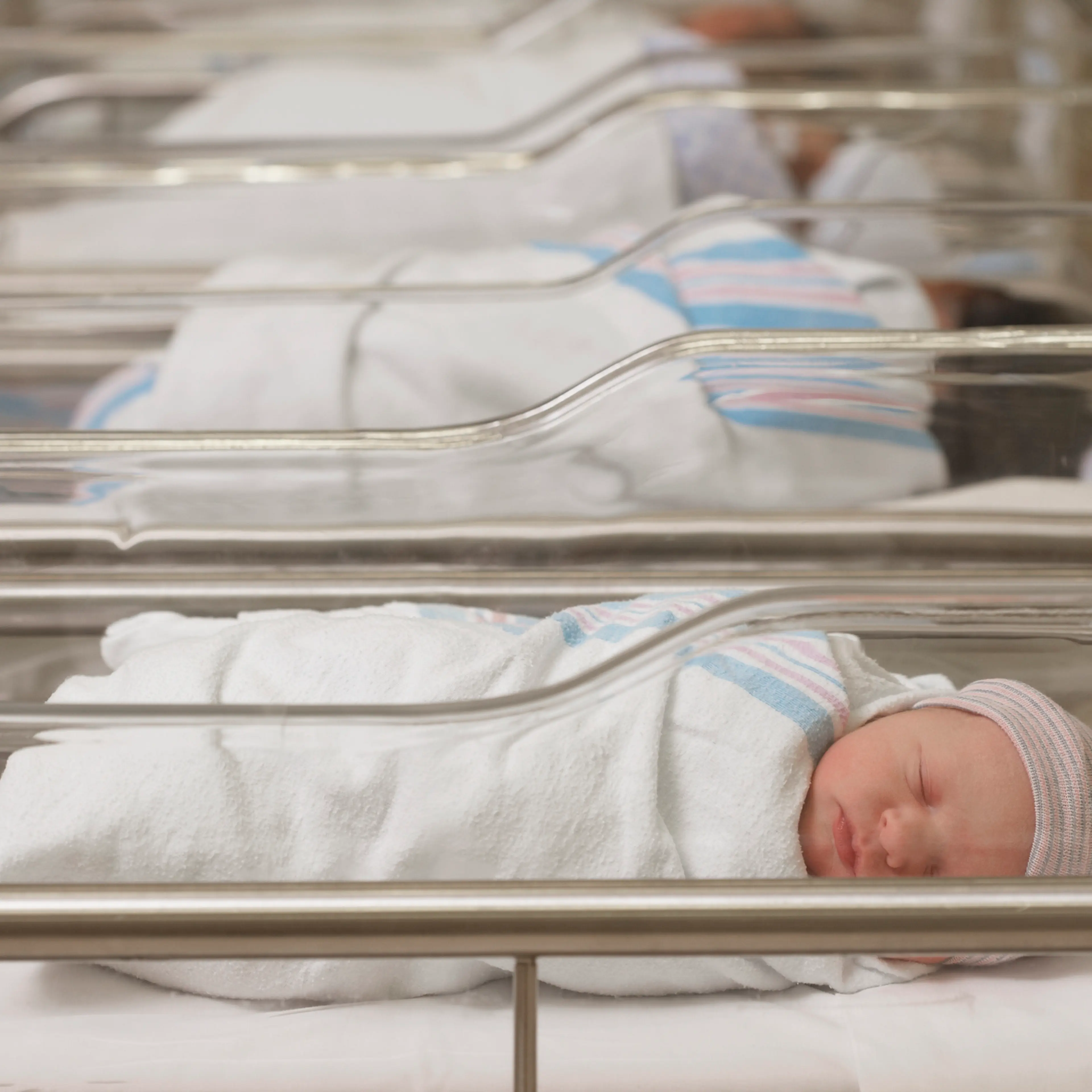 Newborn babies sleeping in hospital nursery