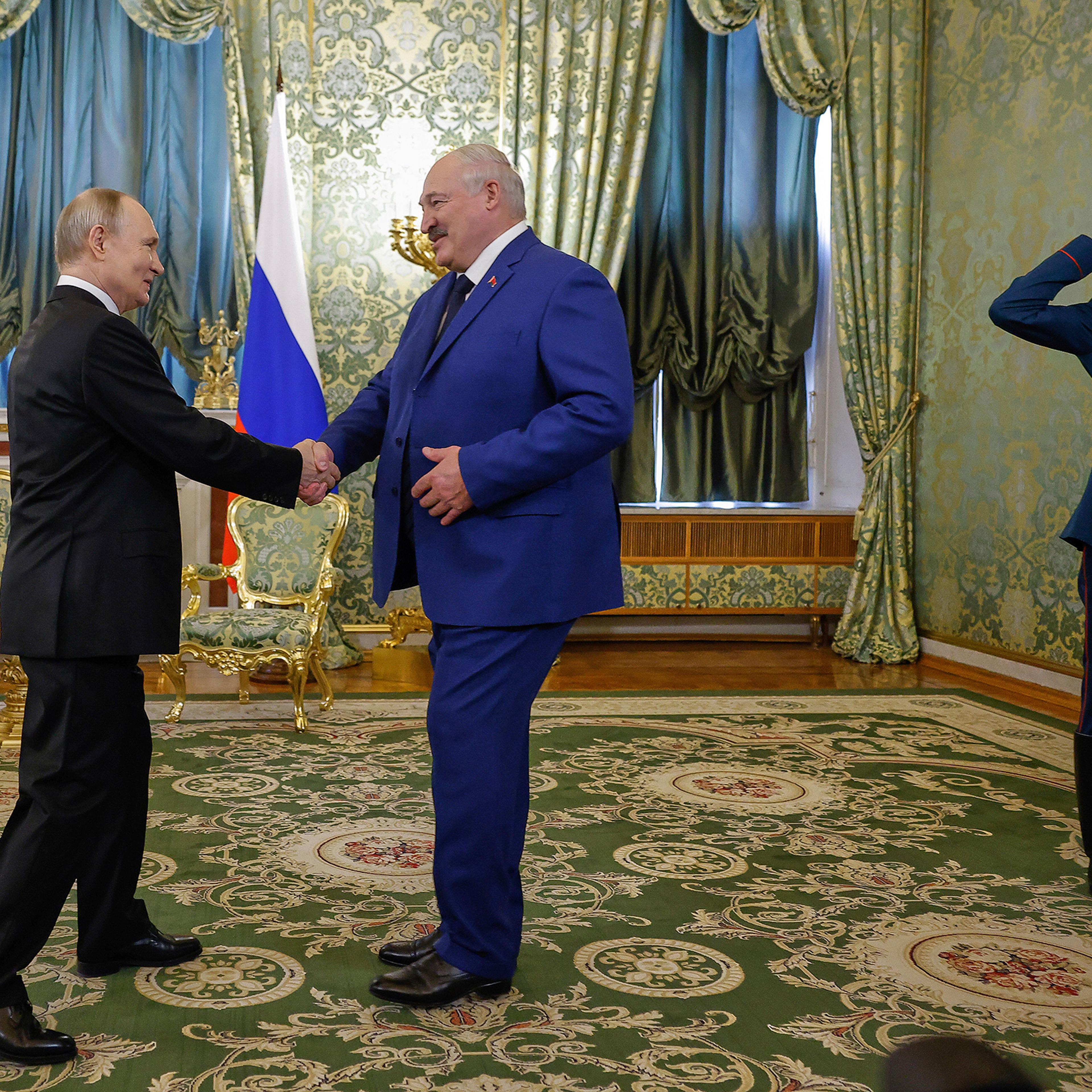 Putin and Lukashenko shake hands during a meeting at the Grand Kremlin Palace in Moscow, March 13, 2025.