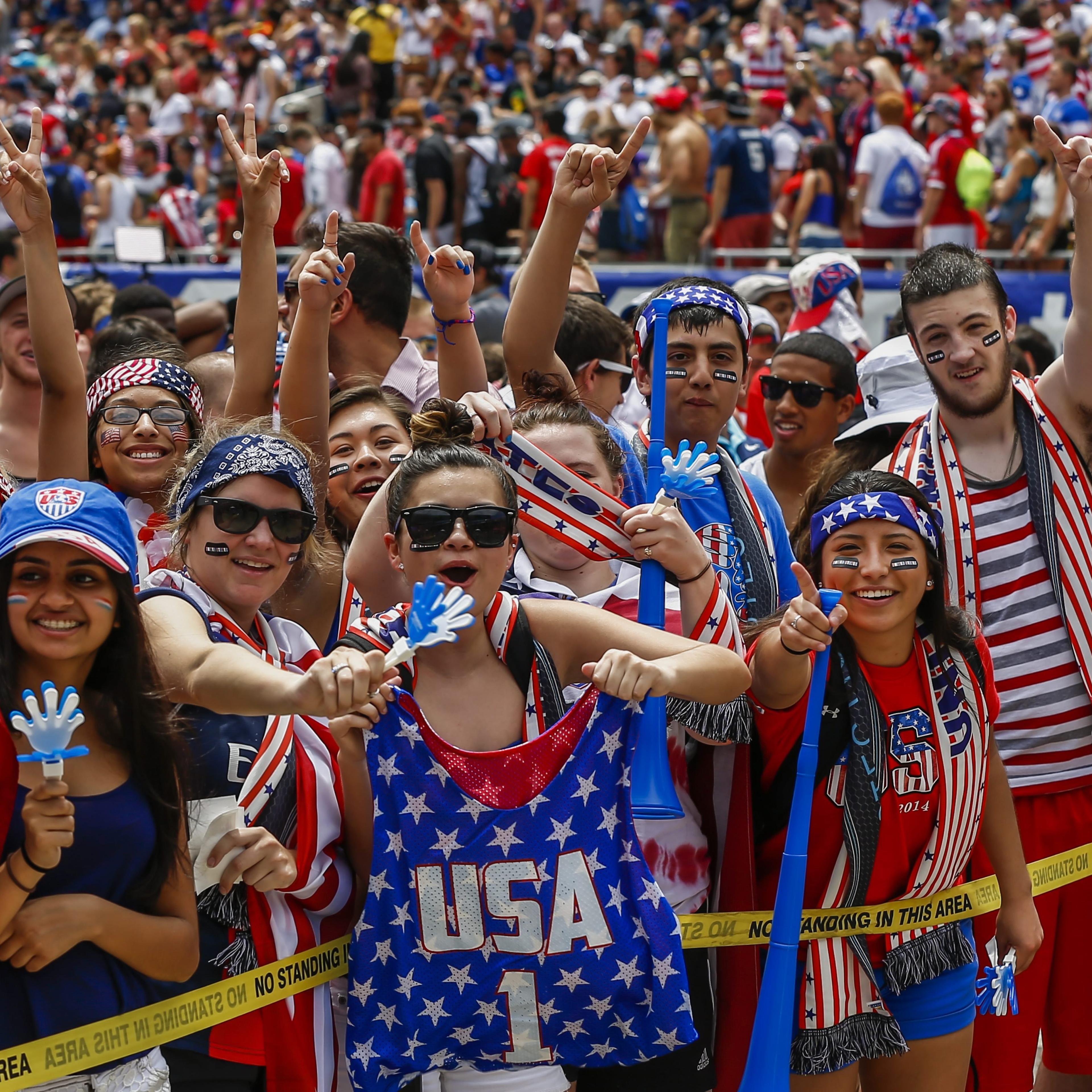 US fans cheer before the start of the FIFA World Cup Round of 16 match between the USA and Belgium played at the Arena Fonte Nova in Salvador, Brazil, at Soldier Field in Chicago, on July 1, 2014.
