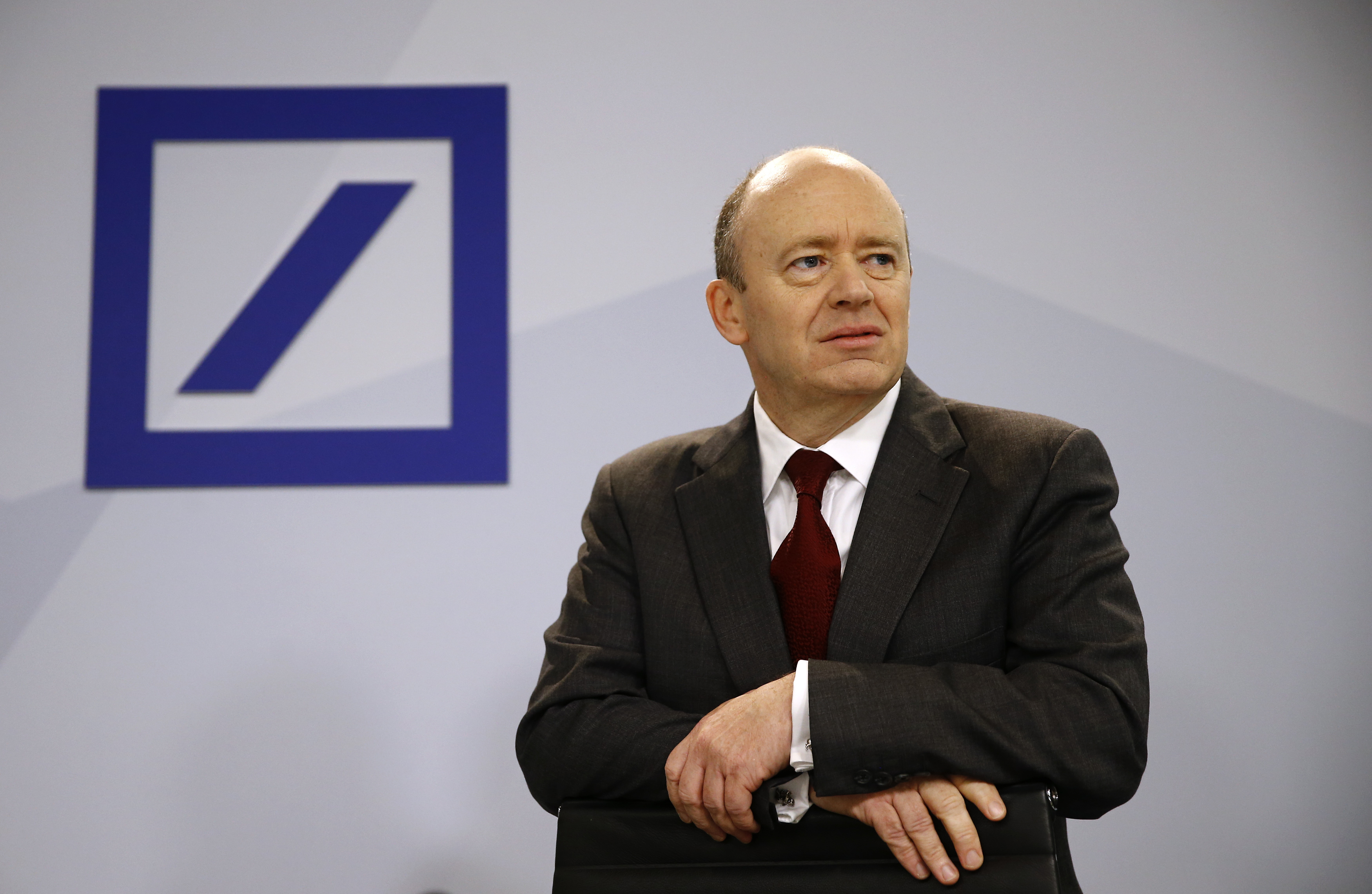Deutsche Bank new Chief Executive John Cryan arrives for a news conference in Frankfurt