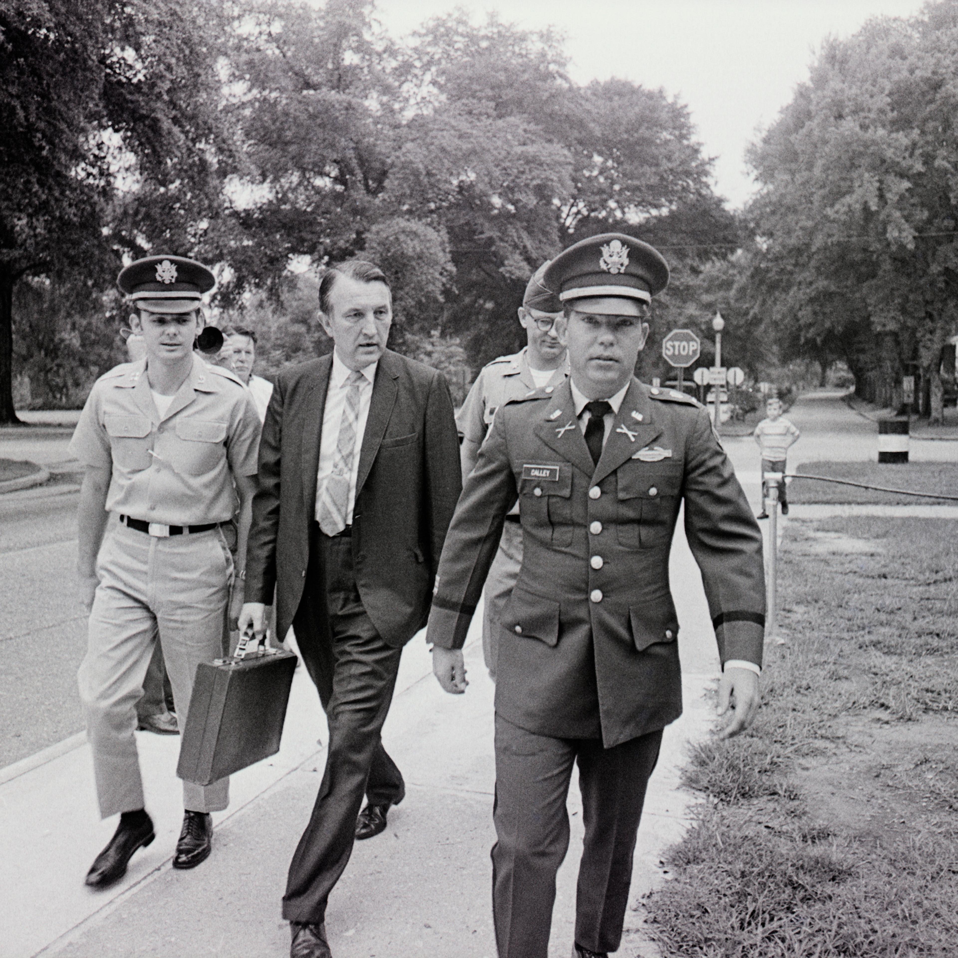Wm. Calley Walking W/Attorney & Officer