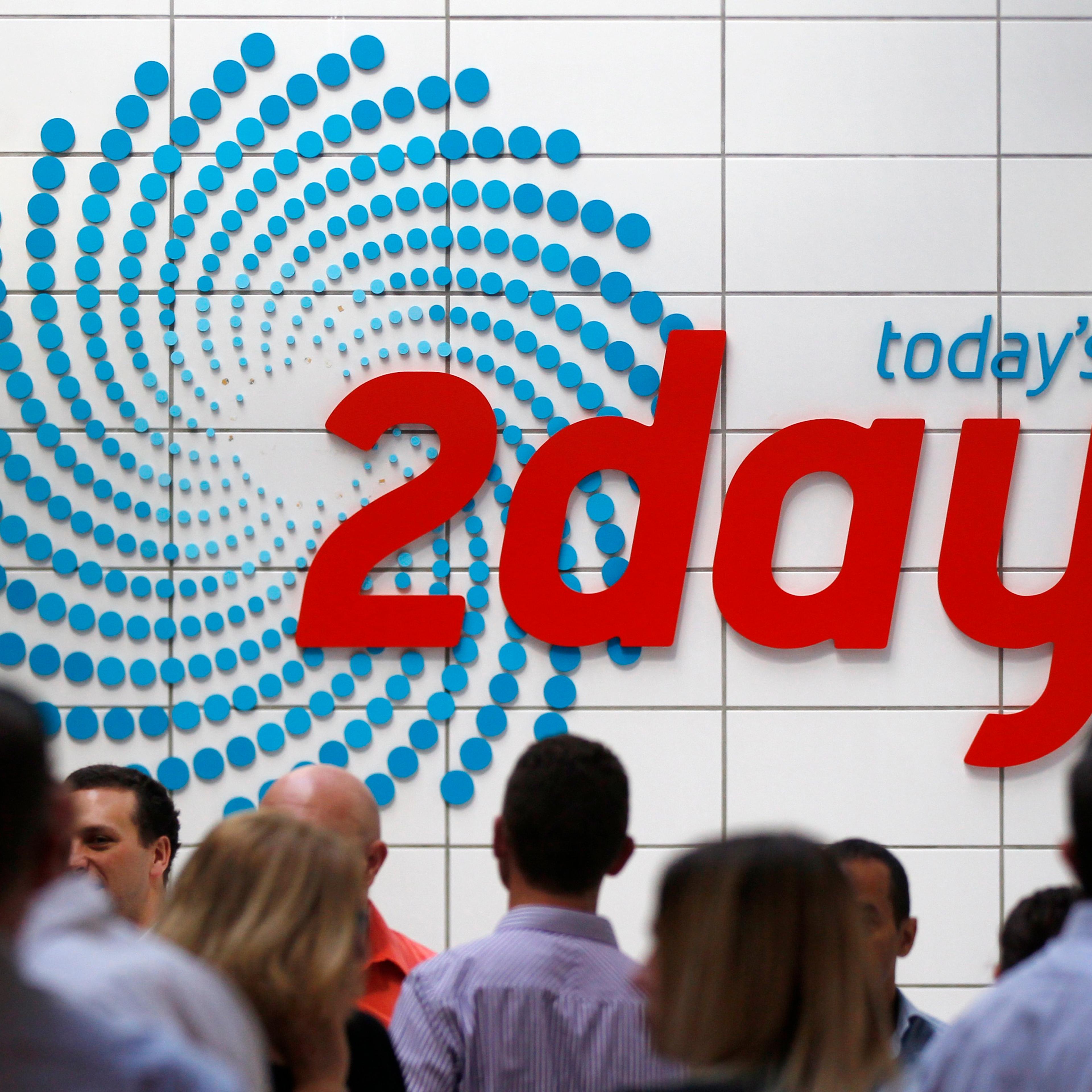 People gather in the foyer of the building that houses the 2Day FM radio station in Sydney December 6, 2012.