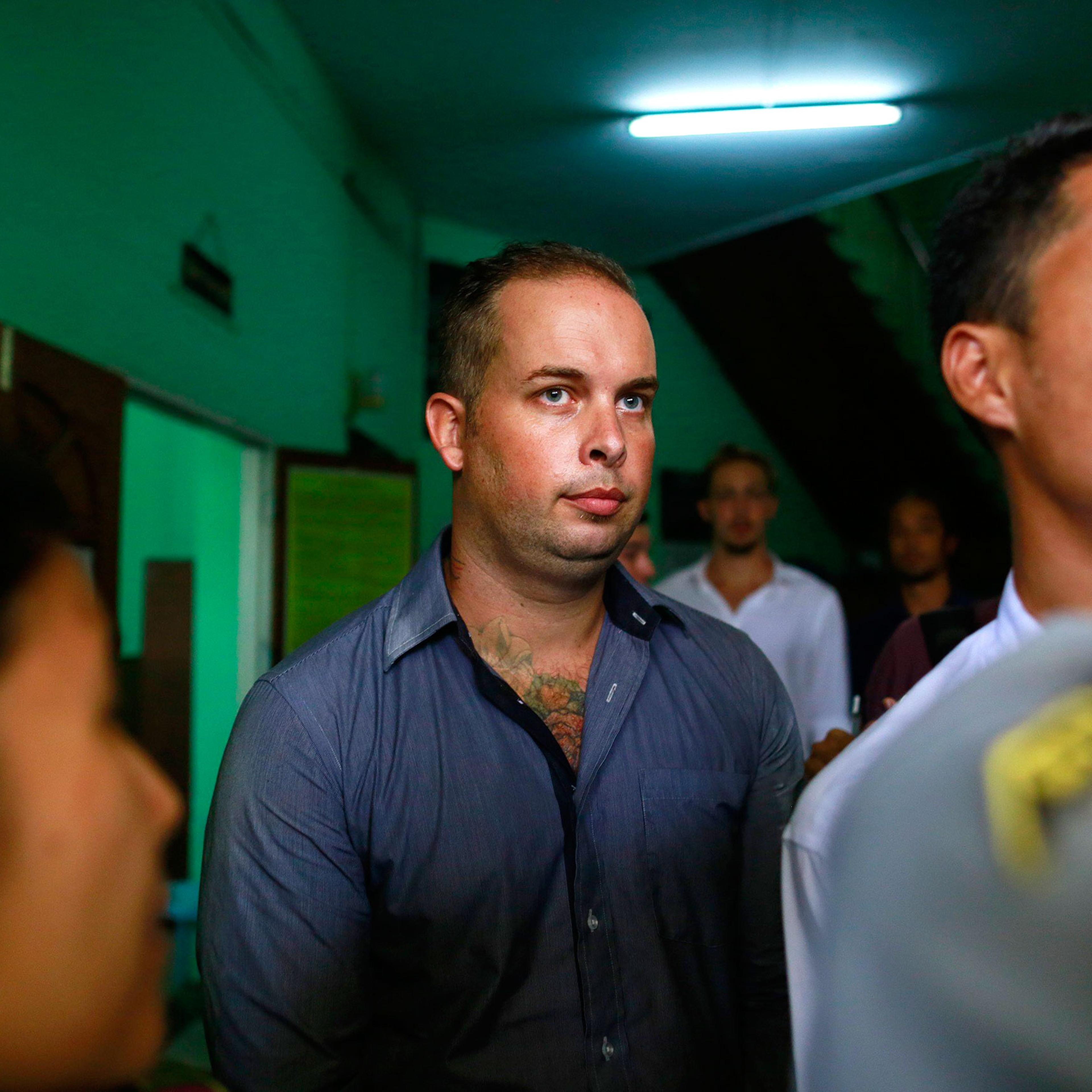 Phil Blackwood, a bar manager from New Zealand, comes out of court after being sentenced to two and half years in prison, at Bahan township court in Yangon on March 17, 2015.