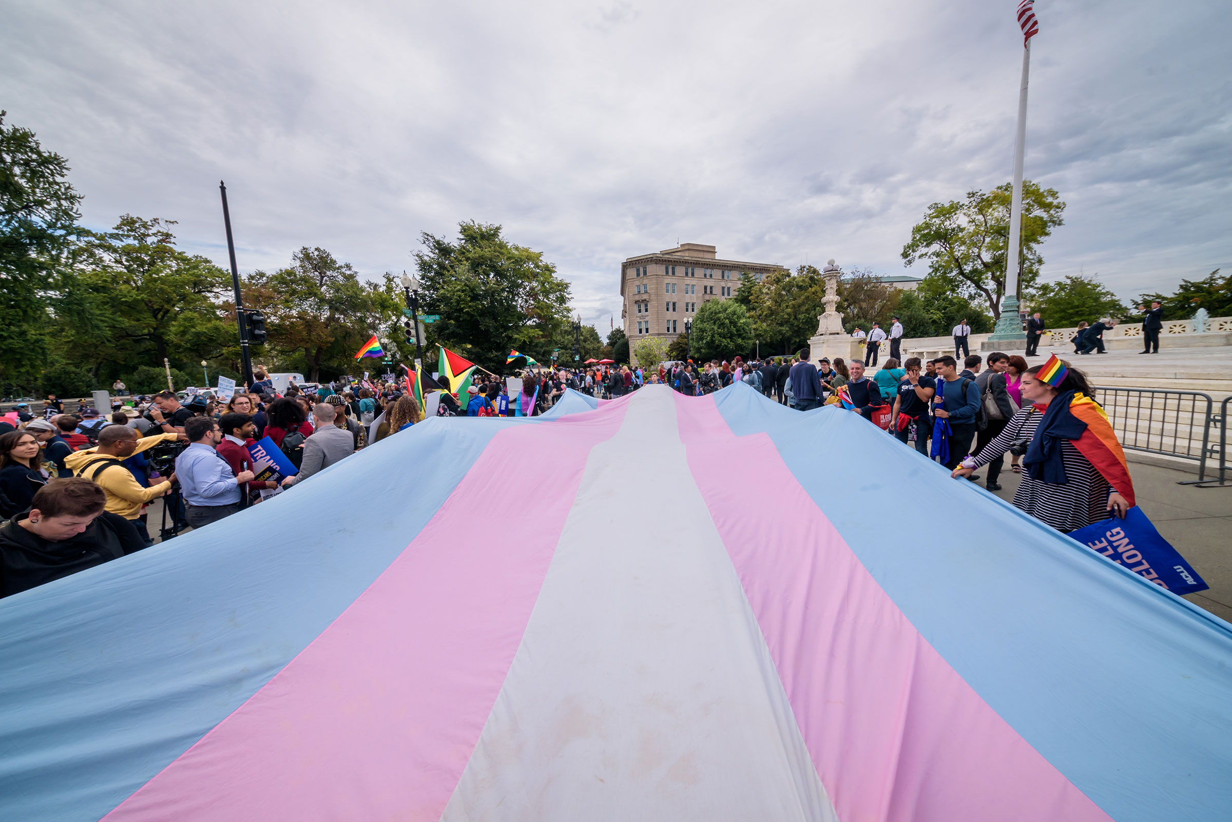 A large Trans Pride Flag unfurled outside the Supreme Court on Oct. 8, 2019.
