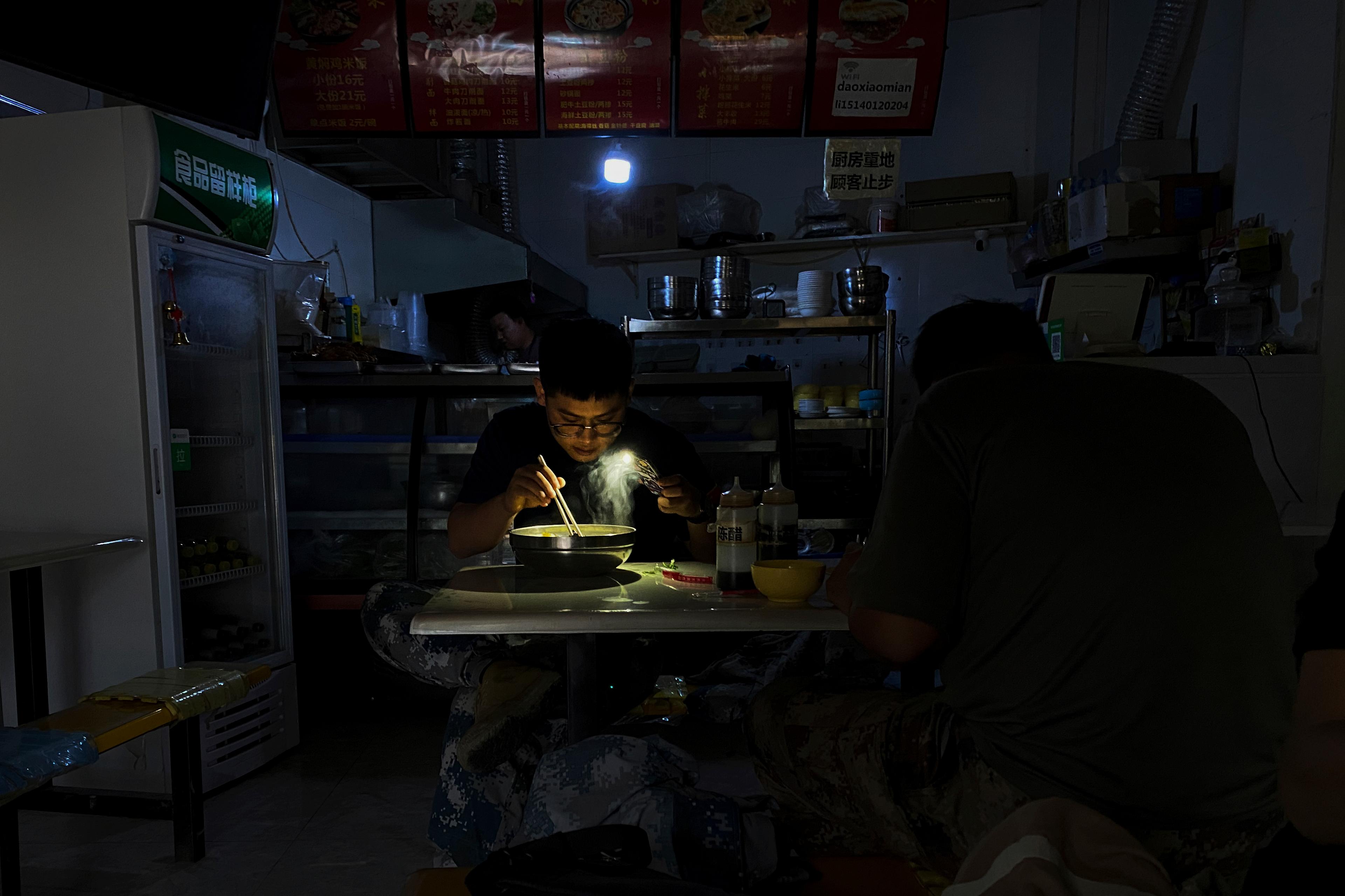 APTOPIX China Power Outages