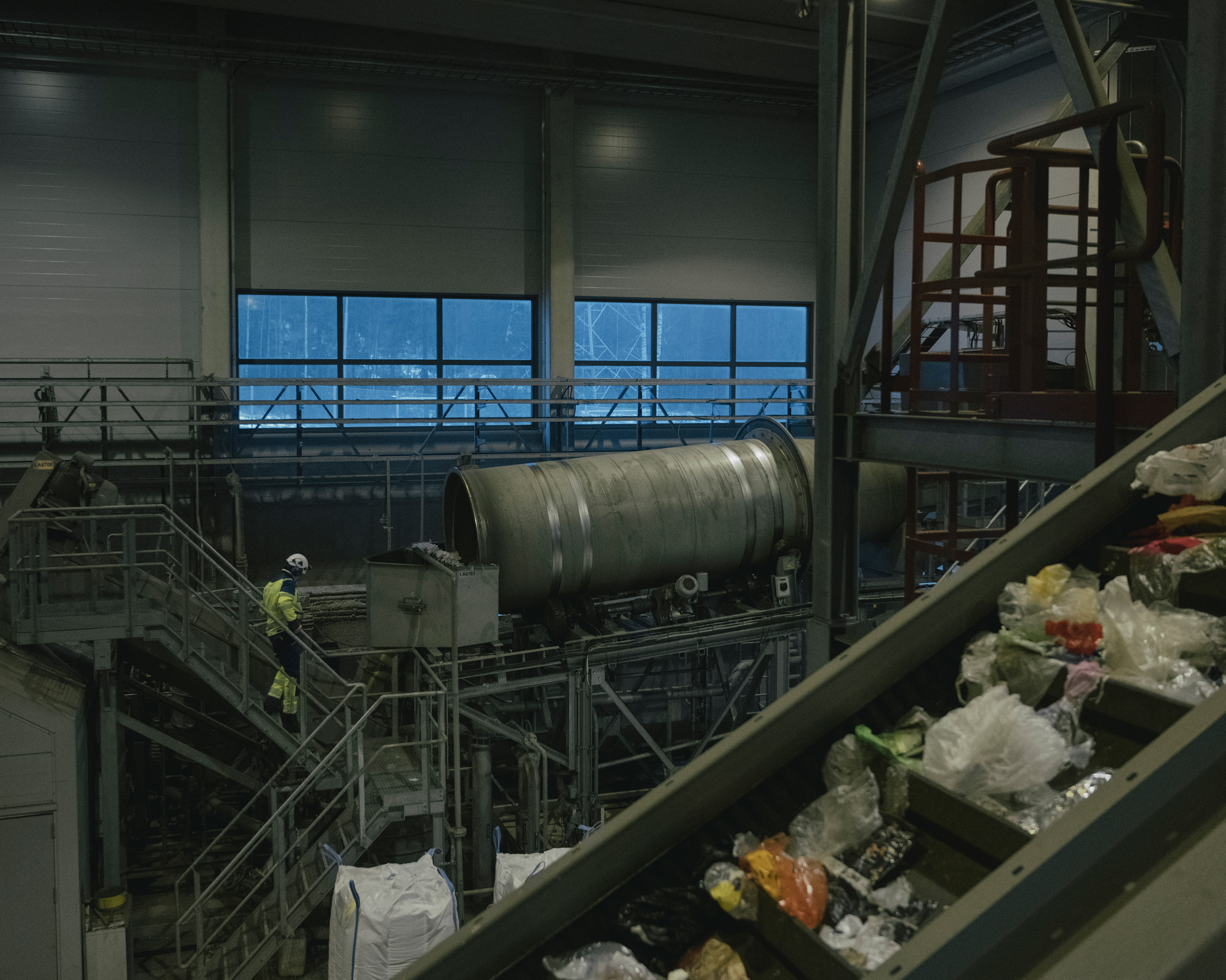 A scene at Fortum Waste Solutions Oy's circular economy facility in Häme, Finland on Dec. 14. In the facility, waste material collected from regular households is converted to clean plastic through Fortum’s Eco Refinery—an automated sorting plant