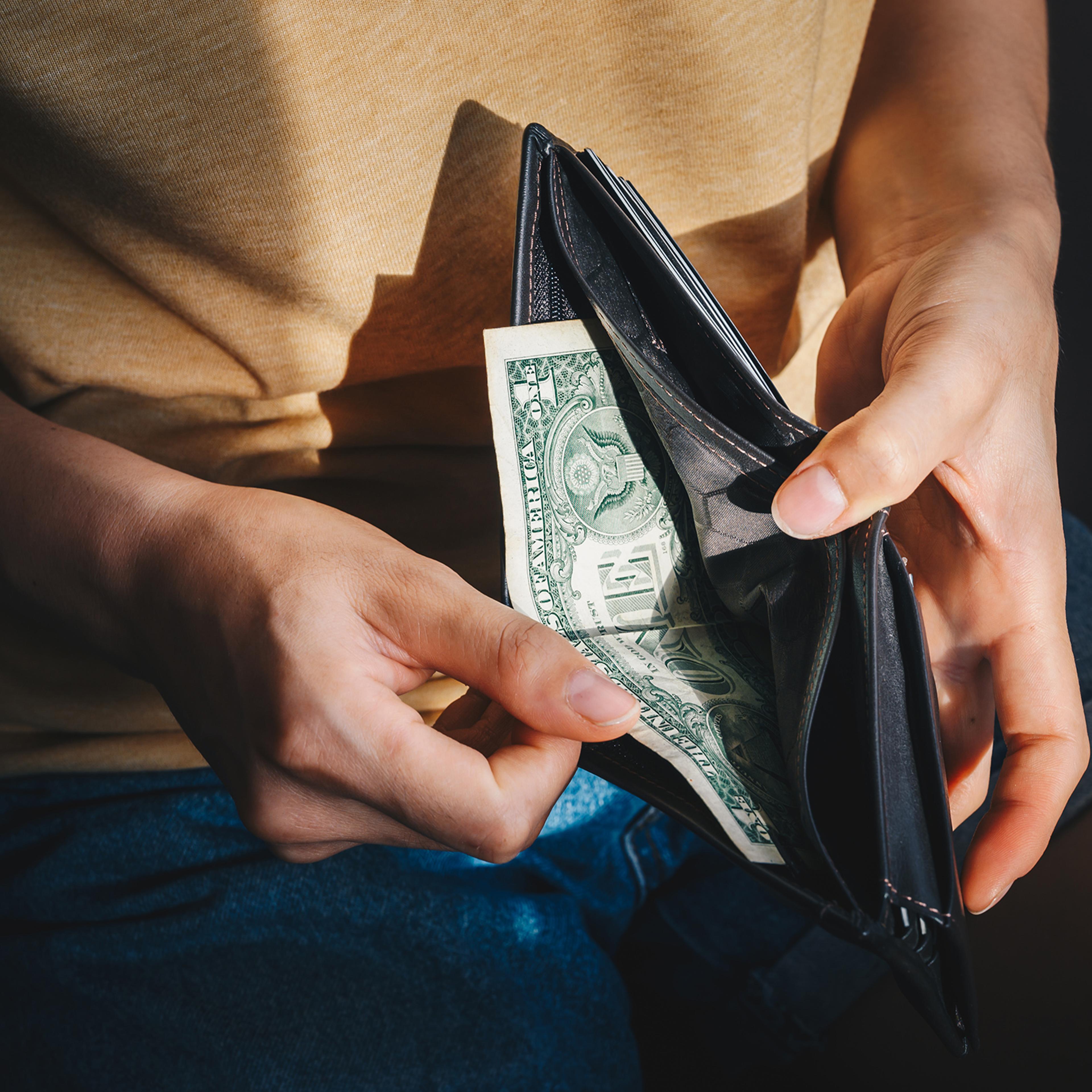 Person opening wallet