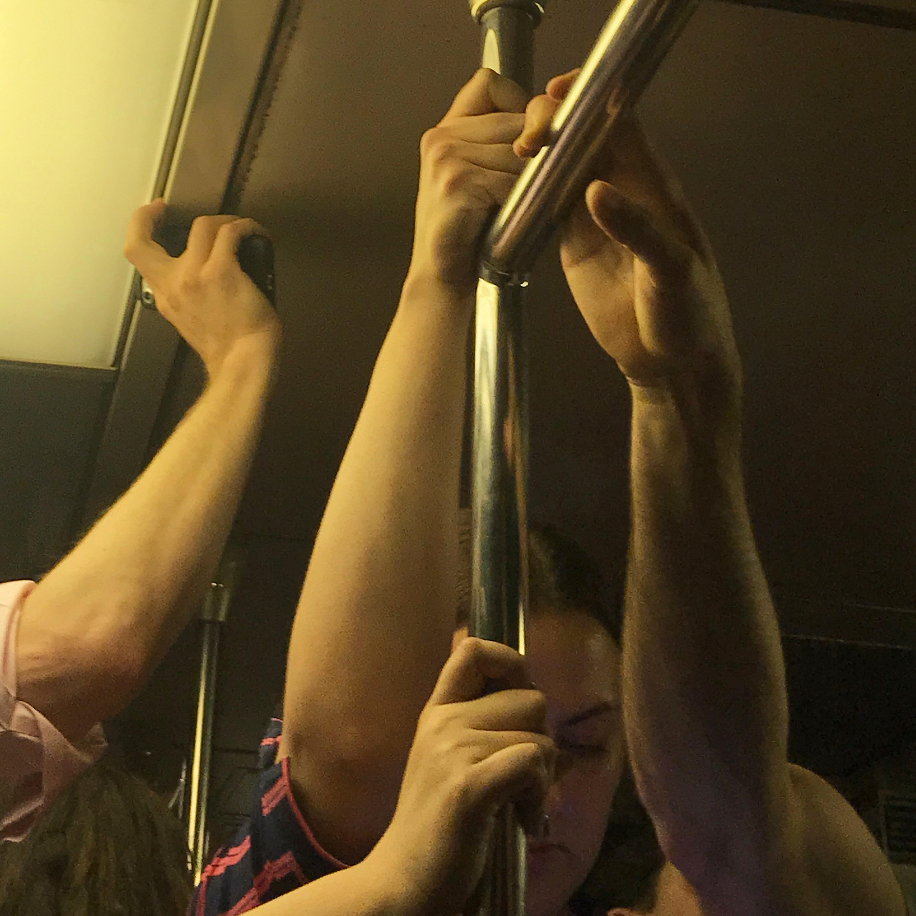 People on a crowded subway before the covid-19 pandemic.