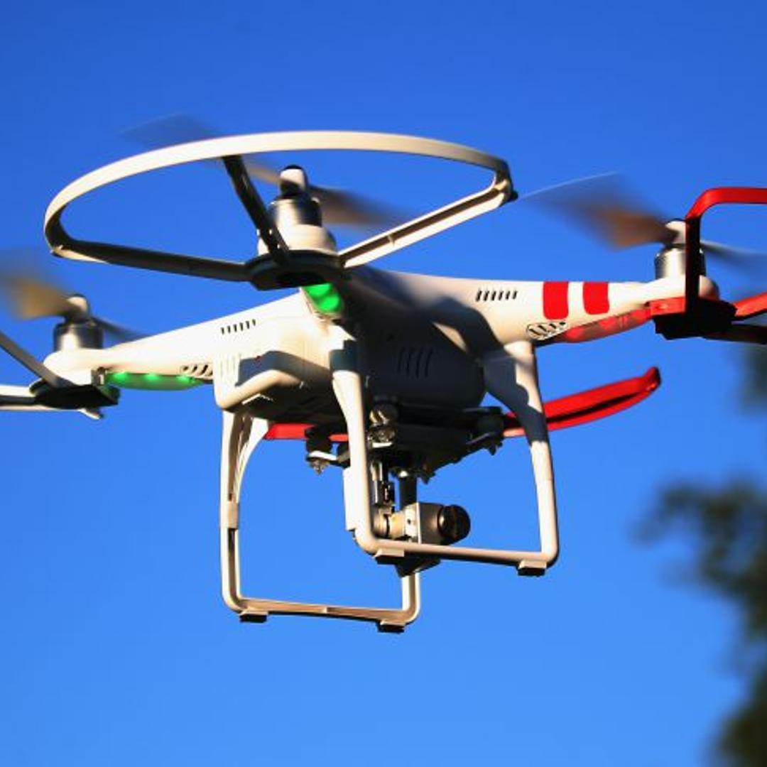 A drone is flown for recreational purposes in the sky above Old Bethpage, New York on September 5, 2015.