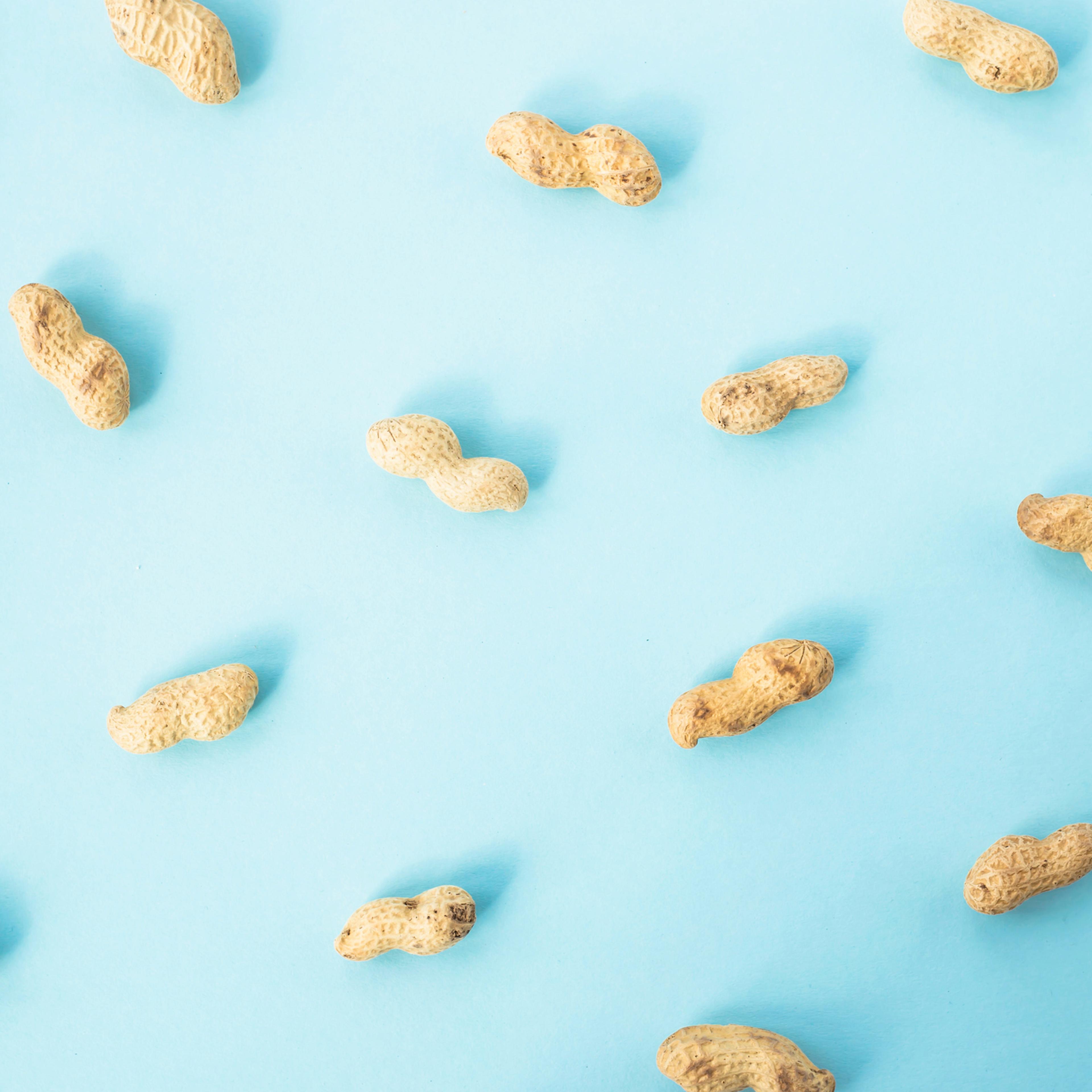 Peanuts against blue background