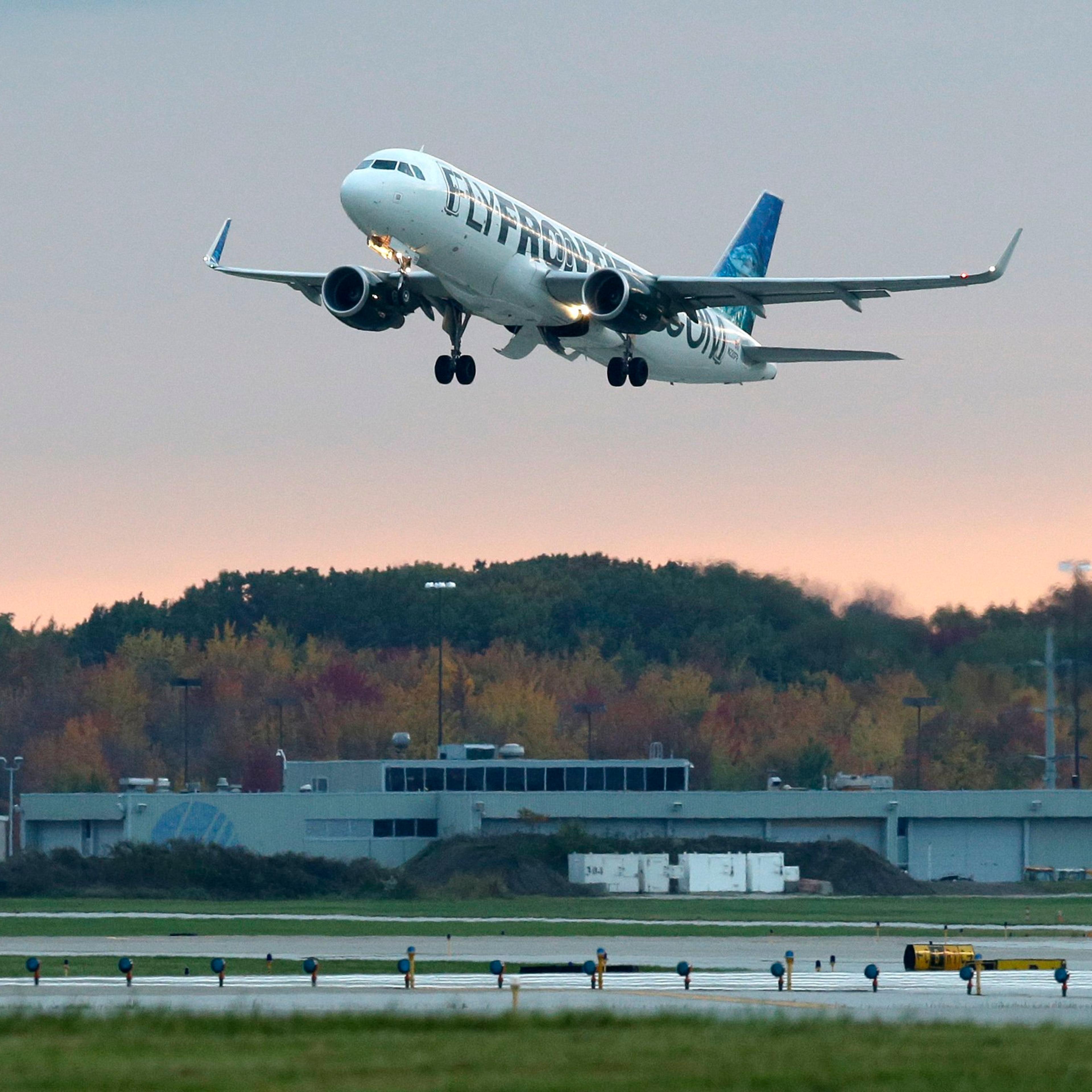 The Frontier Airlines plane that Amber Vinson flew from Cleveland to Dallas on Monday, flies out of Cleveland Hopkins International Airport Wednesday, Oct. 15, 2014, in Cleveland.