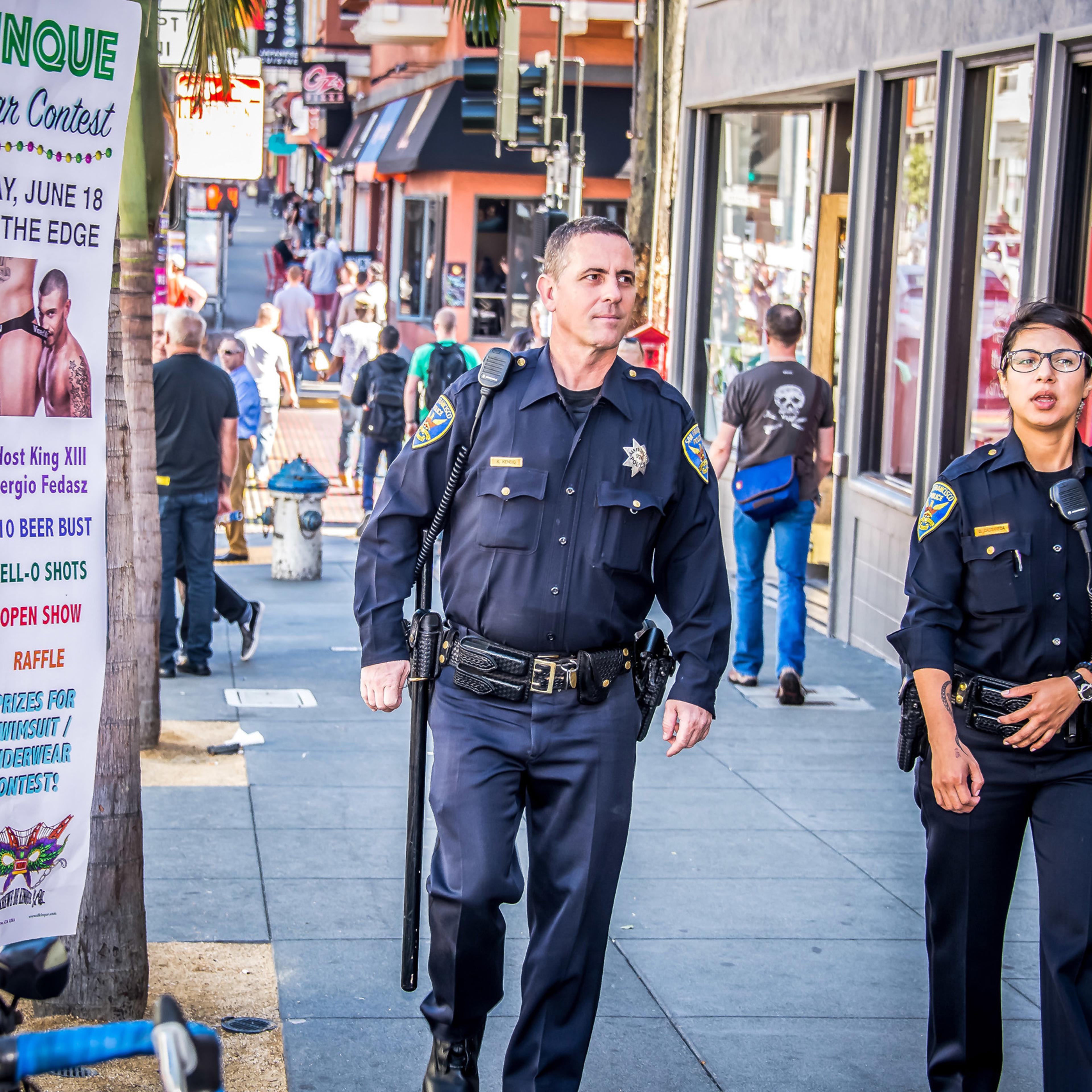 SFPD Officers patrol Castro Street in San Francisco on June 18, 2016.