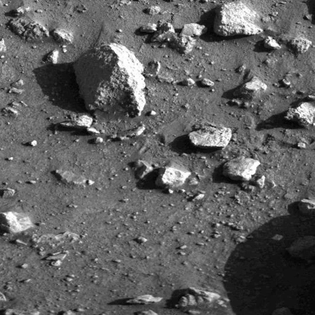 Taken by the Viking 1 lander shortly after it touched down, this image is the first photograph ever taken from the surface of Mars, July 20, 1976.