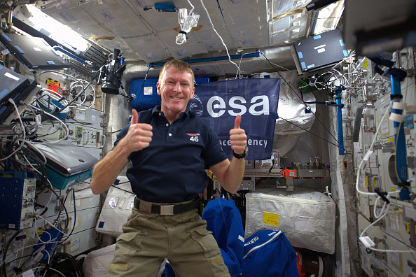 ESA astronaut Tim Peake gives the thumbs up in zero gravity days after his arrival on the International Space Station, December 18, 2015.