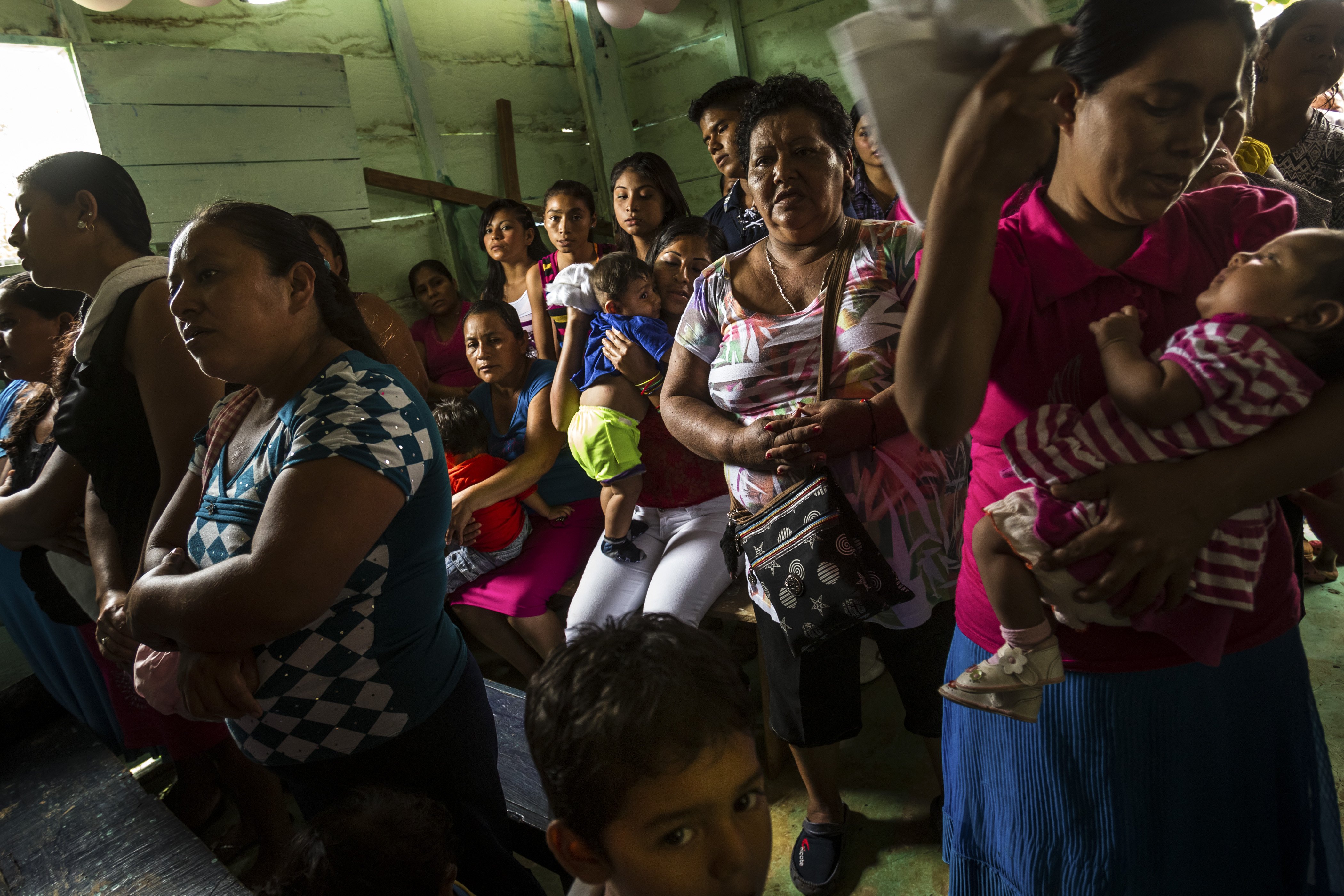 Members of a Catholic church in a small town along the Guatemala and Mexico border hold a special mass celebrating the Virgin of Shelter.