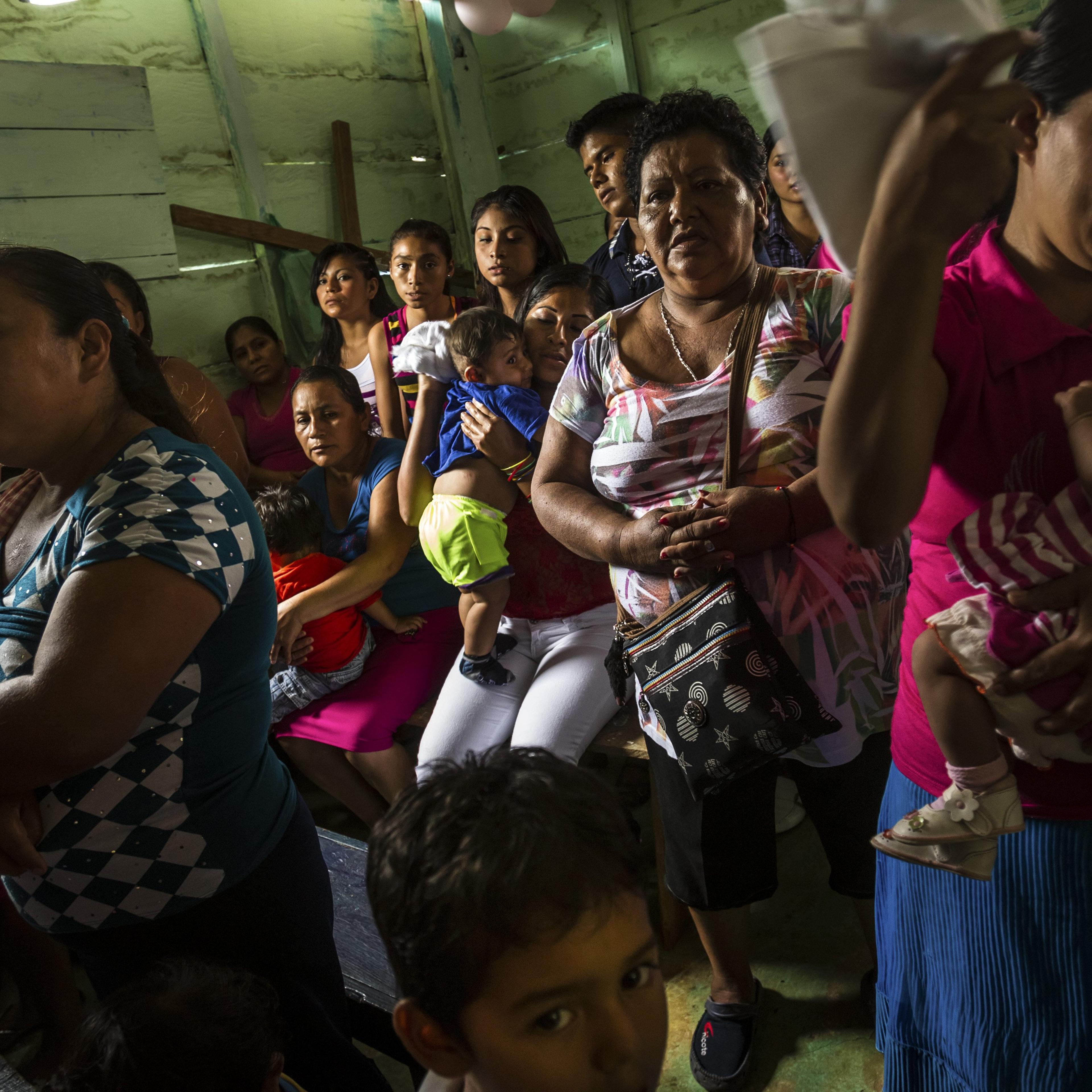 Members of a Catholic church in a small town along the Guatemala and Mexico border hold a special mass celebrating the Virgin of Shelter.