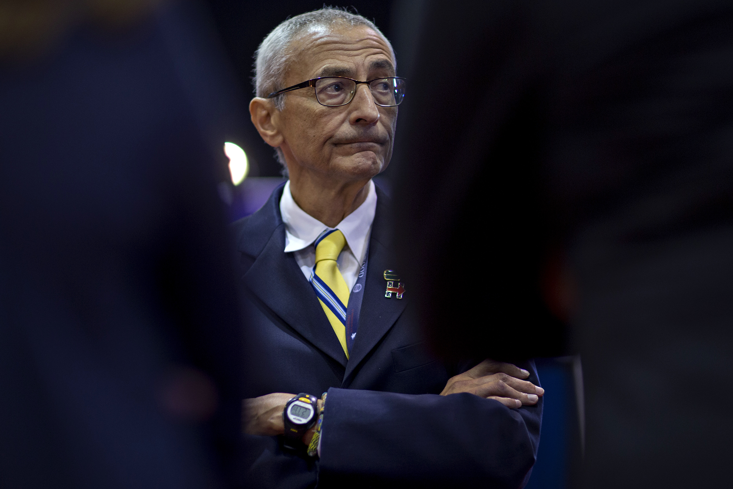 John Podesta, campaign chairman of the Democratic Nominee Hillary Clinton, waits to speak to members of the media in the spin room ahead of the vice presidential debate at Longwood University in Farmville, Va., on Oct. 4, 2016.