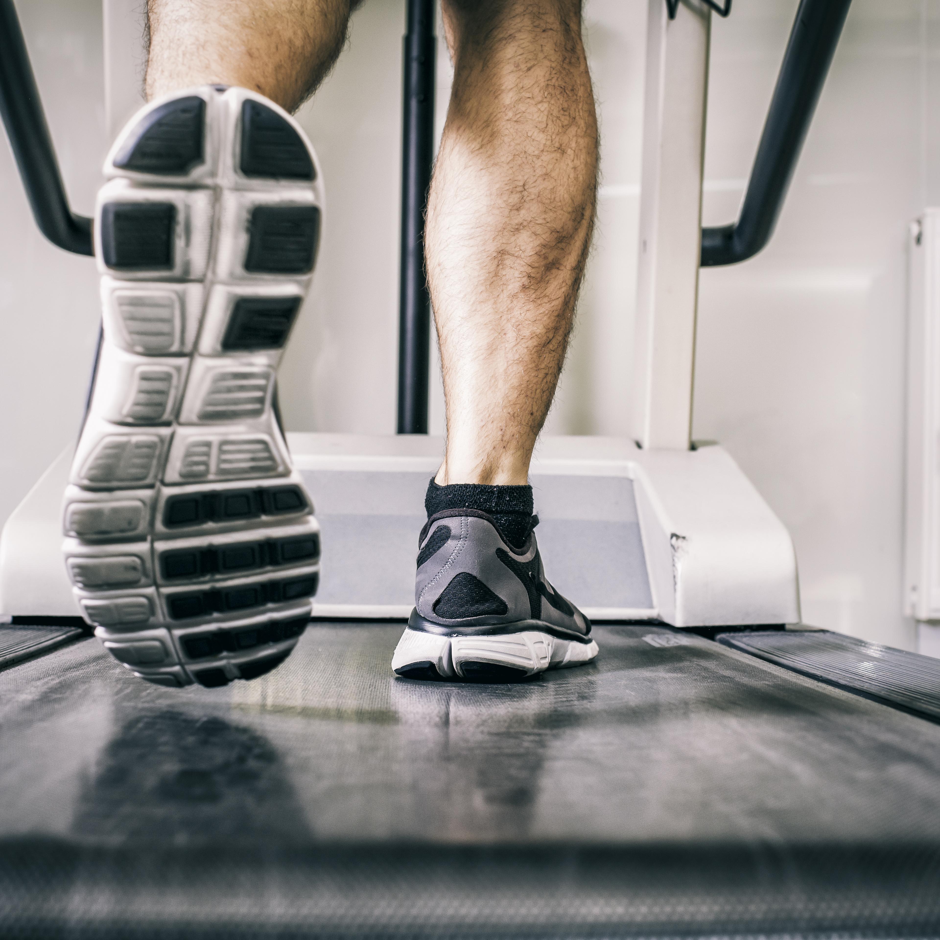 man running on treadmill