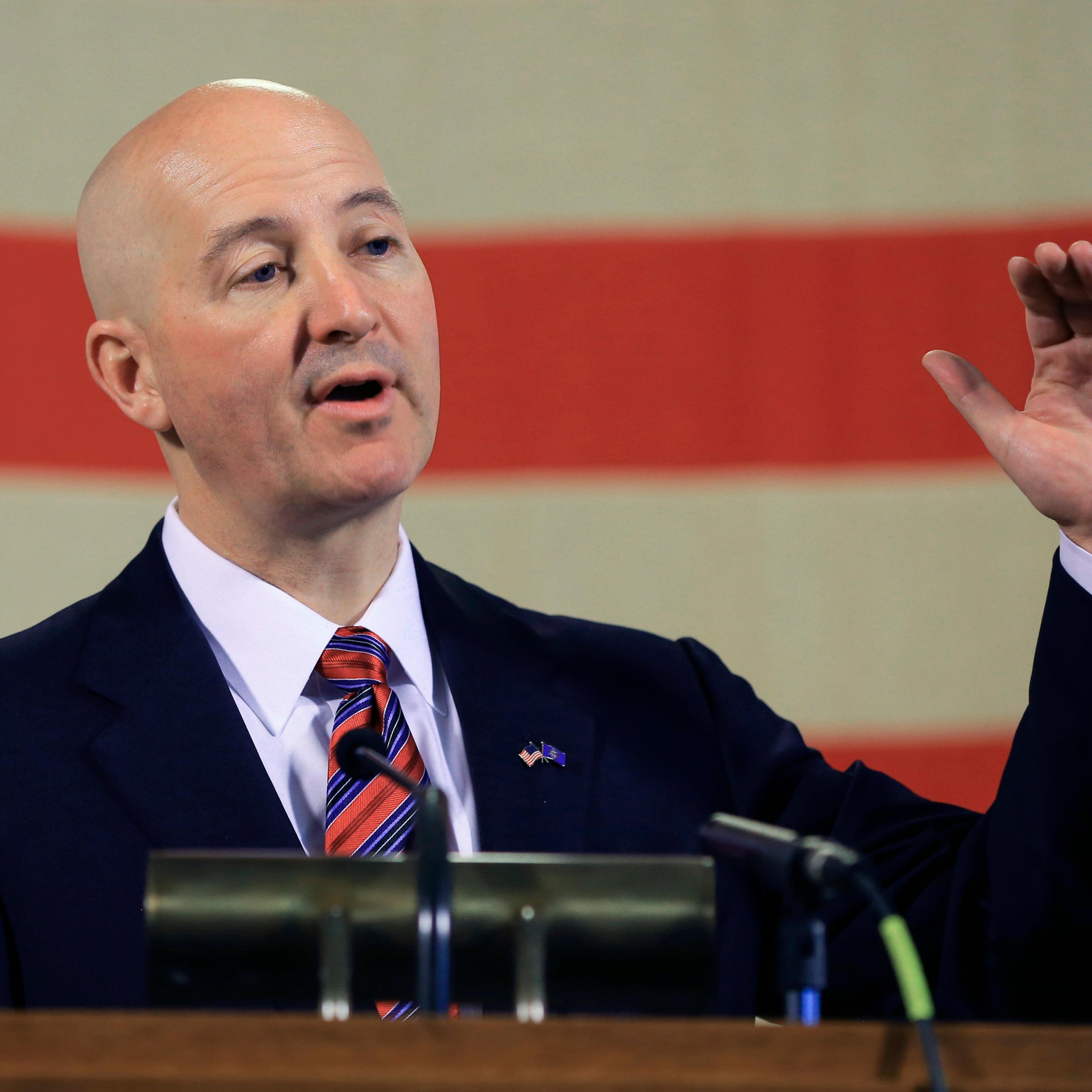 Neb. Gov. Pete Ricketts gestures during a news conference in Lincoln, Neb. on May 20, 2015.