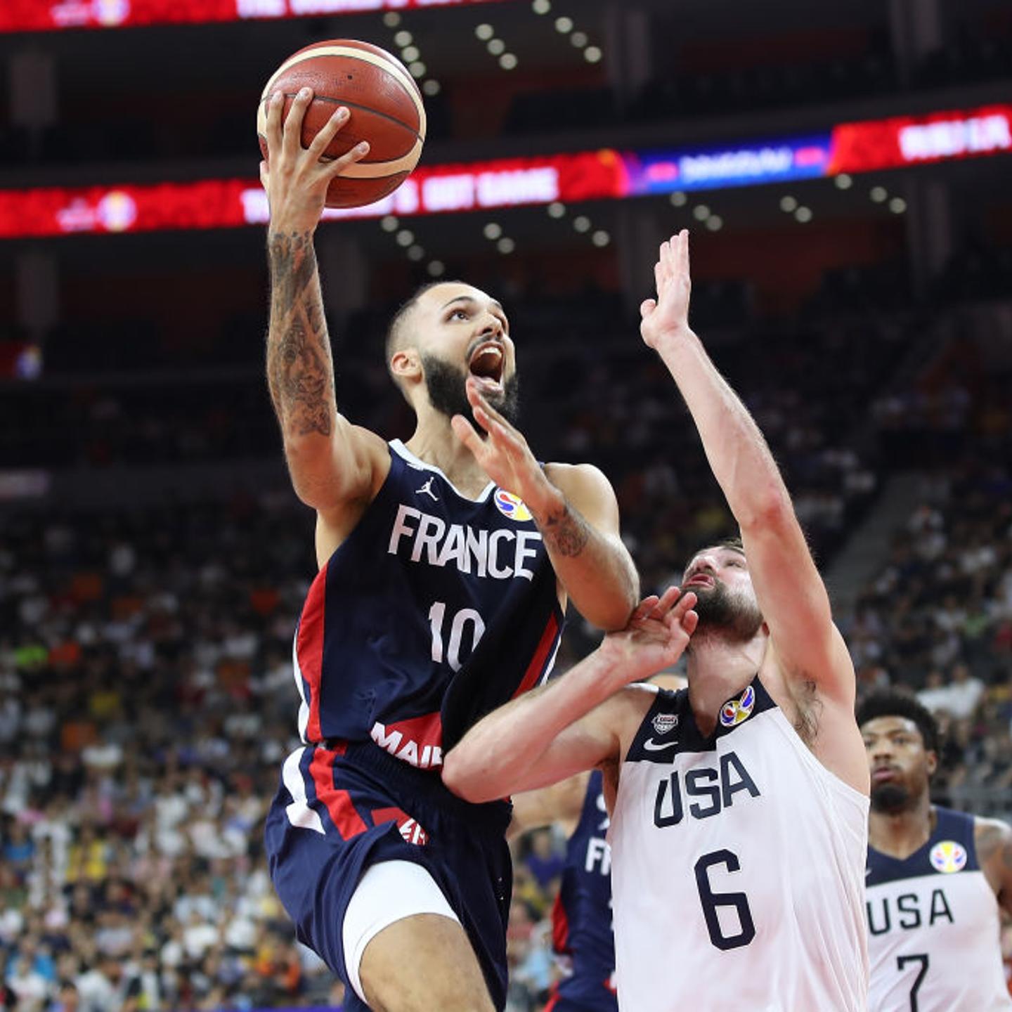 Evan Fournier #10 of France in action against Joe Harris of USA during FIBA World Cup 2019 Quarter-finals match between USA and France at Dongguan Basketball Center on September 11, 2019 in Dongguan, China.