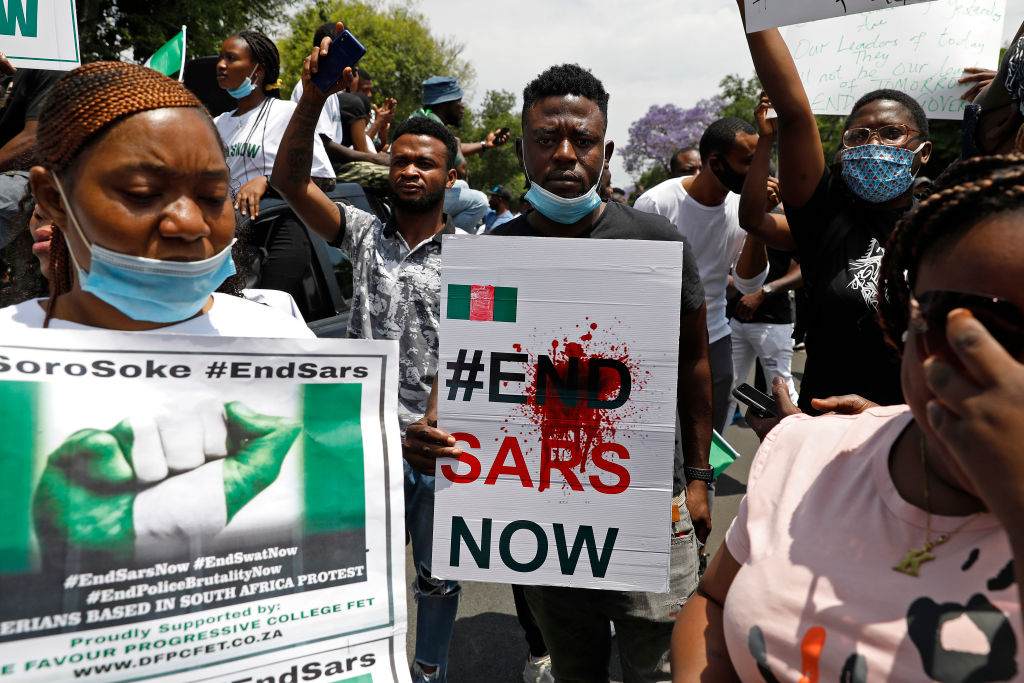 TOPSHOT-SAFRICA-NIGERIA-DEMO-CRIME-POLICE