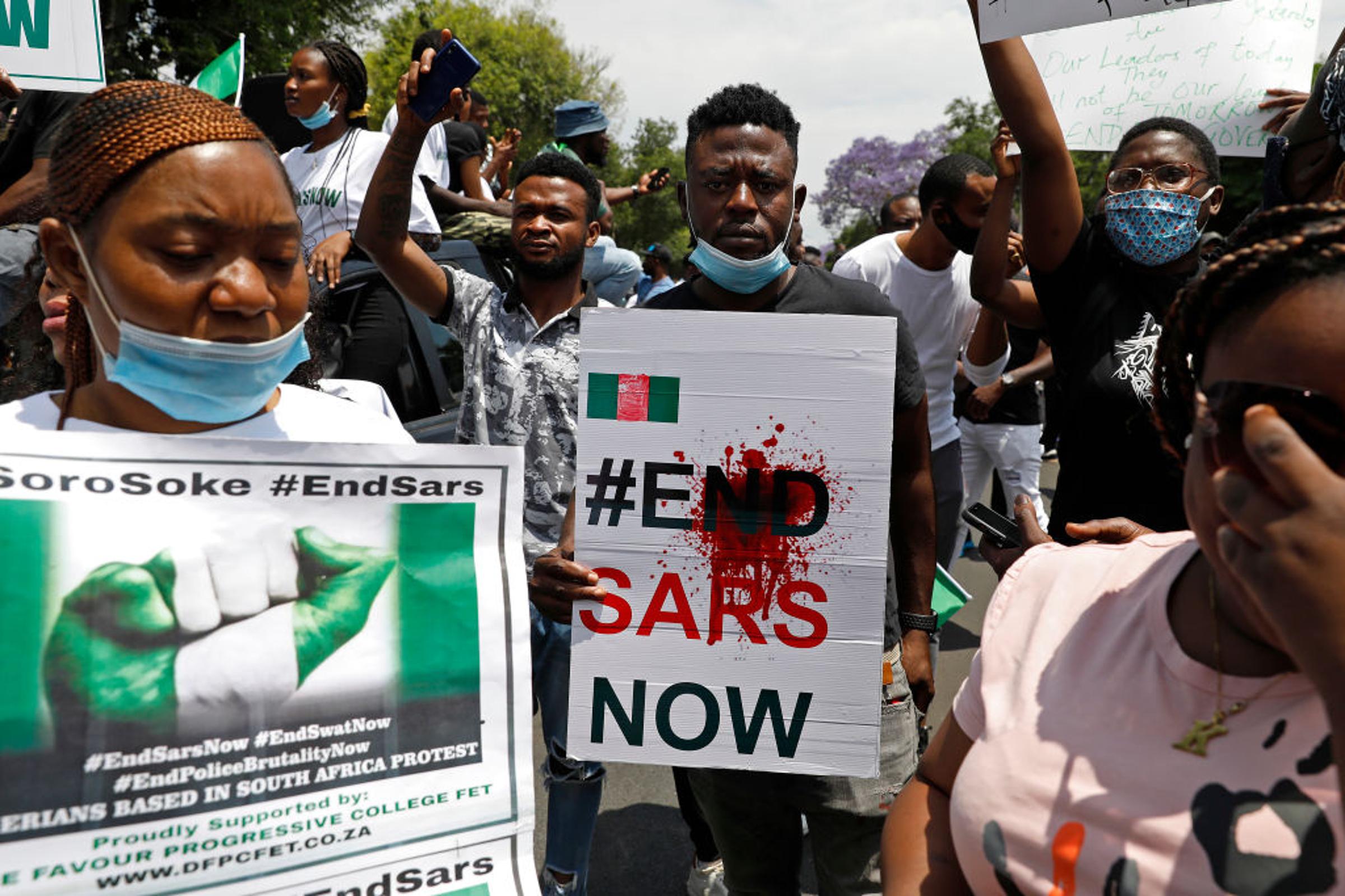 TOPSHOT-SAFRICA-NIGERIA-DEMO-CRIME-POLICE