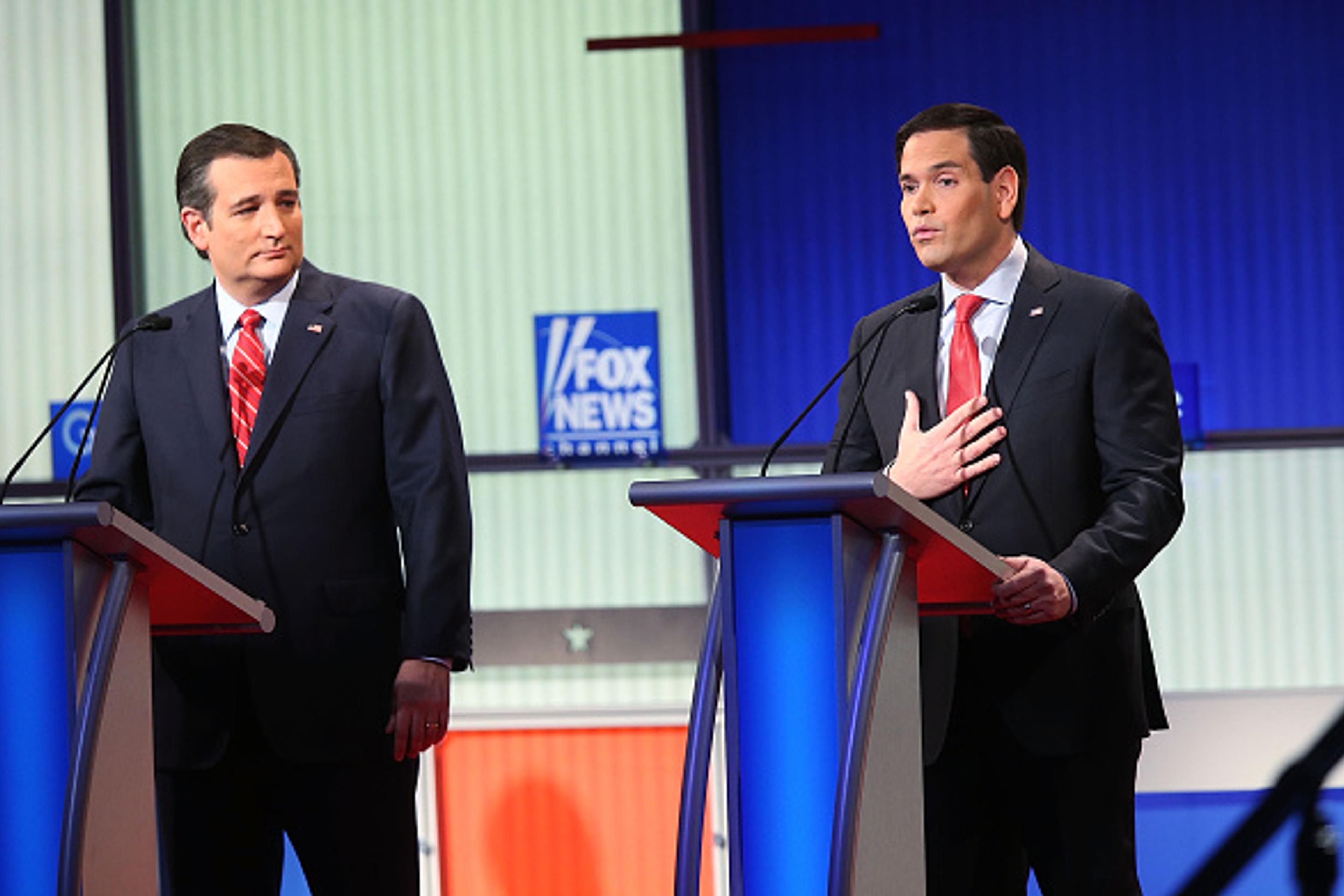 Republican presidential candidates (R-L) Sen. Marco Rubio (R-FL) and Sen. Ted Cruz (R-TX) participate in the Fox News - Google GOP Debate January 28, 2016 at the Iowa Events Center in Des Moines, Iowa.