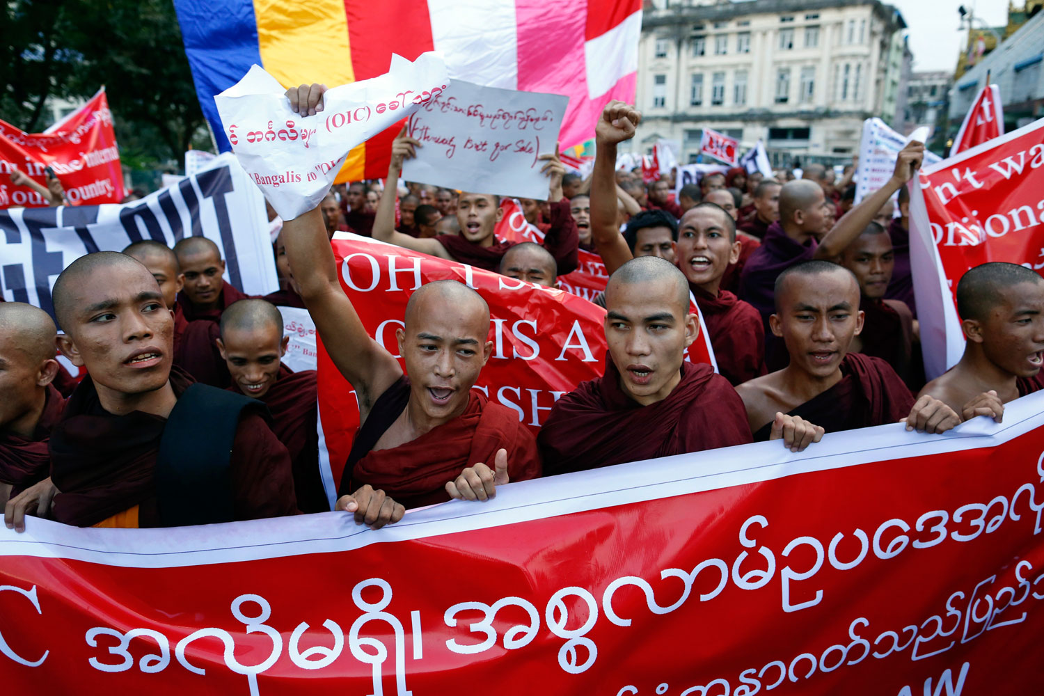 Buddhist monks protest against a visit to Myanmar by a high-level delegation from the Organization of Islamic Cooperation (OIC), in Yangon in November  2013. The clergy play a leading role in stoking anti-Muslim feeling.